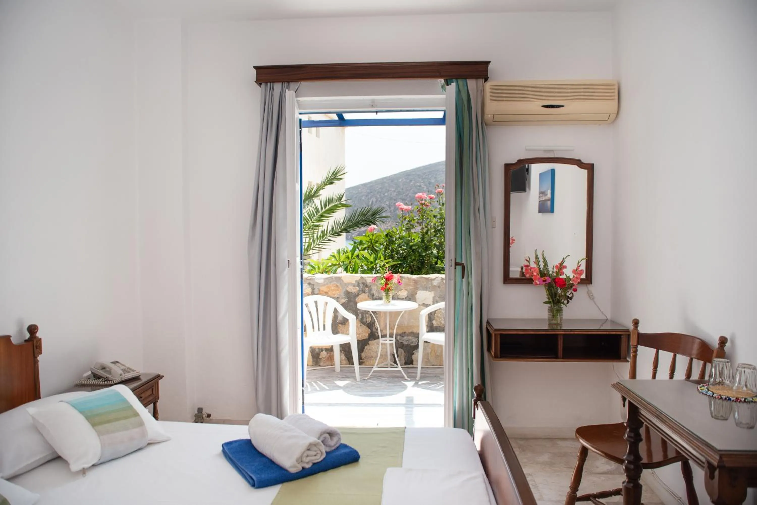 Bed in Adonis Hotel Naxos