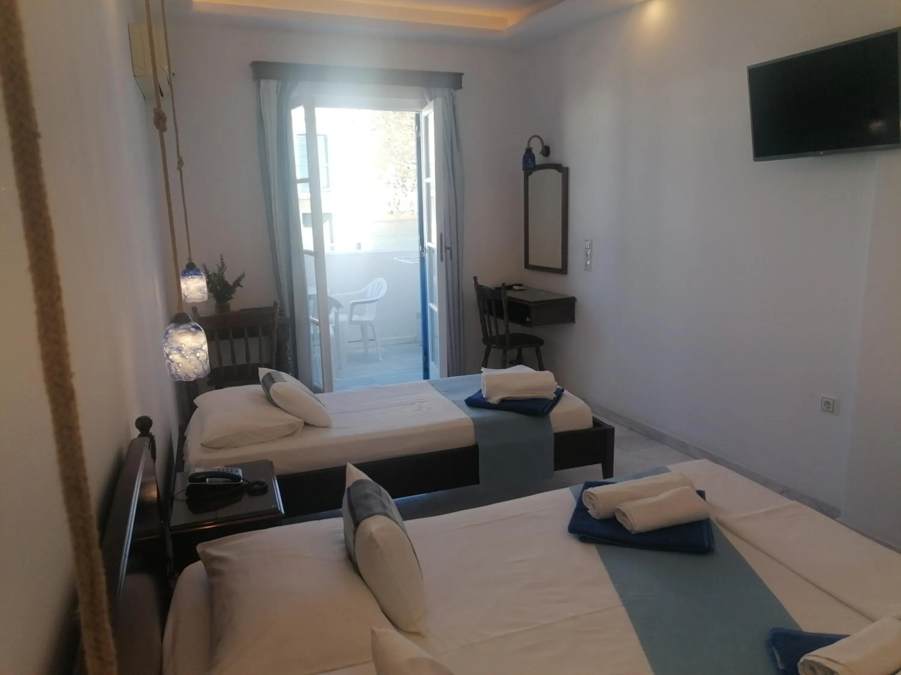 Bed in Adonis Hotel Naxos