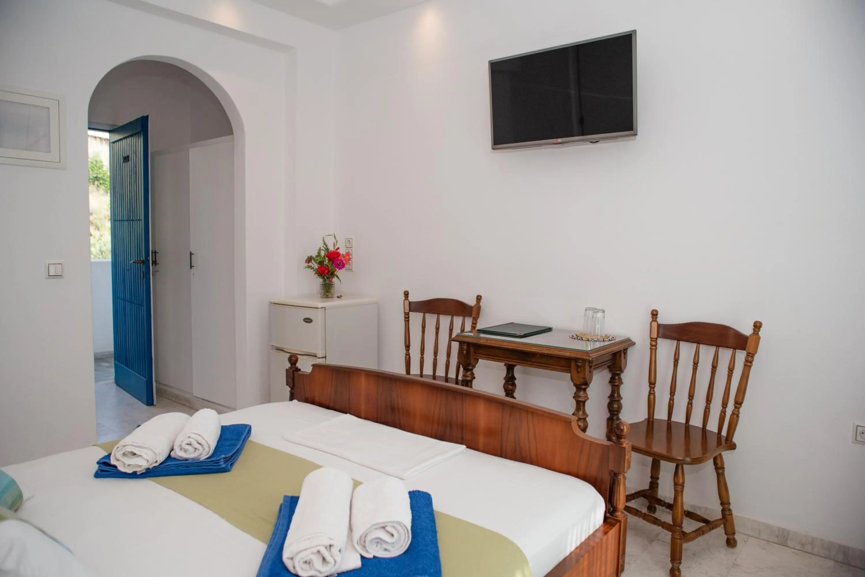 Bed in Adonis Hotel Naxos