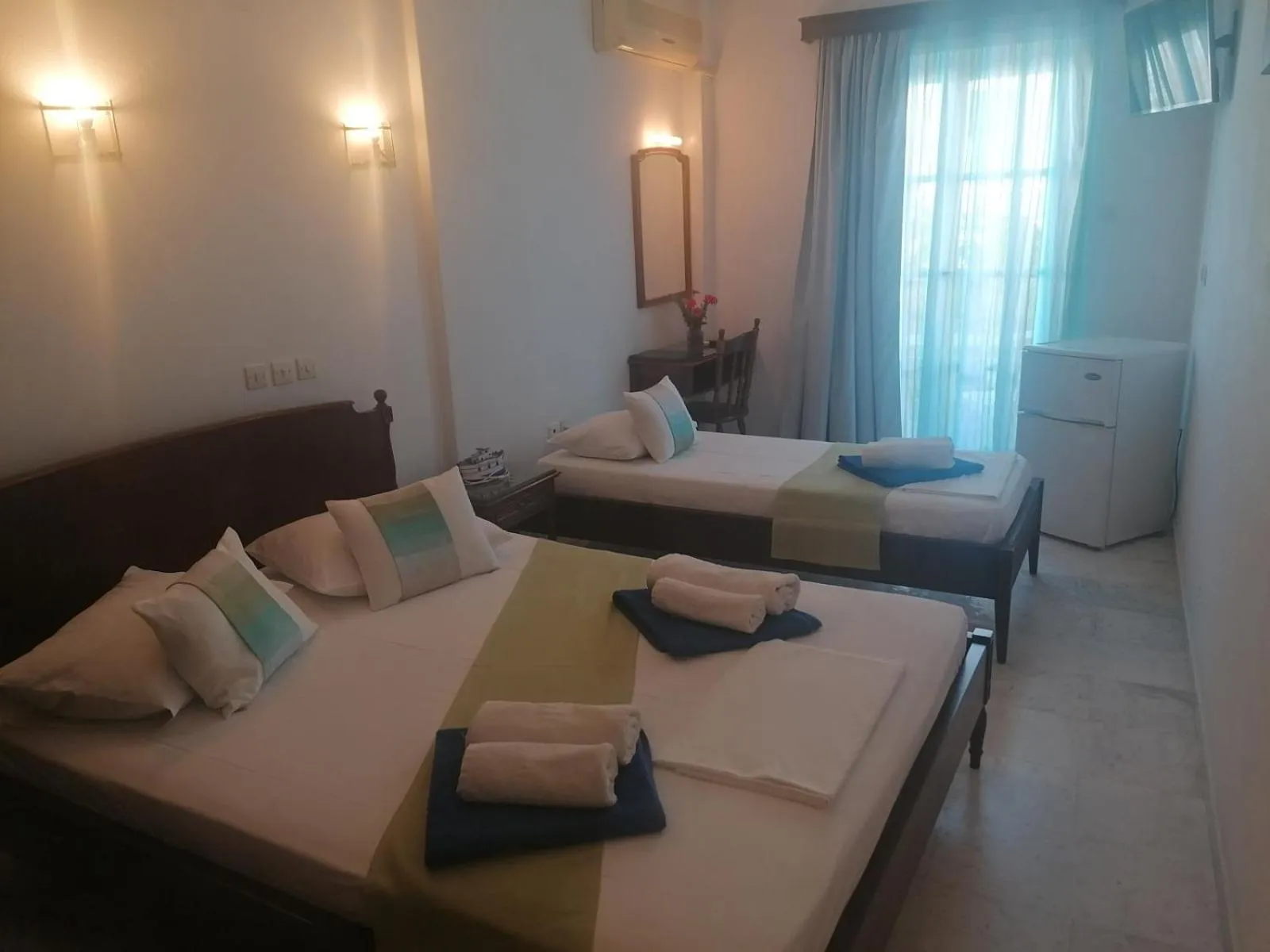 Bed in Adonis Hotel Naxos