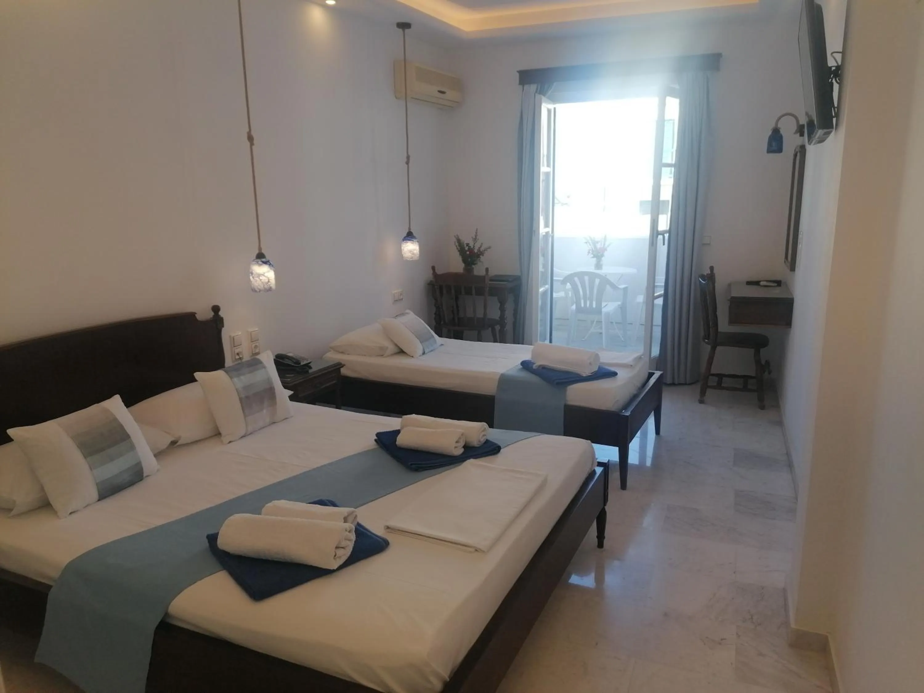 Bed in Adonis Hotel Naxos