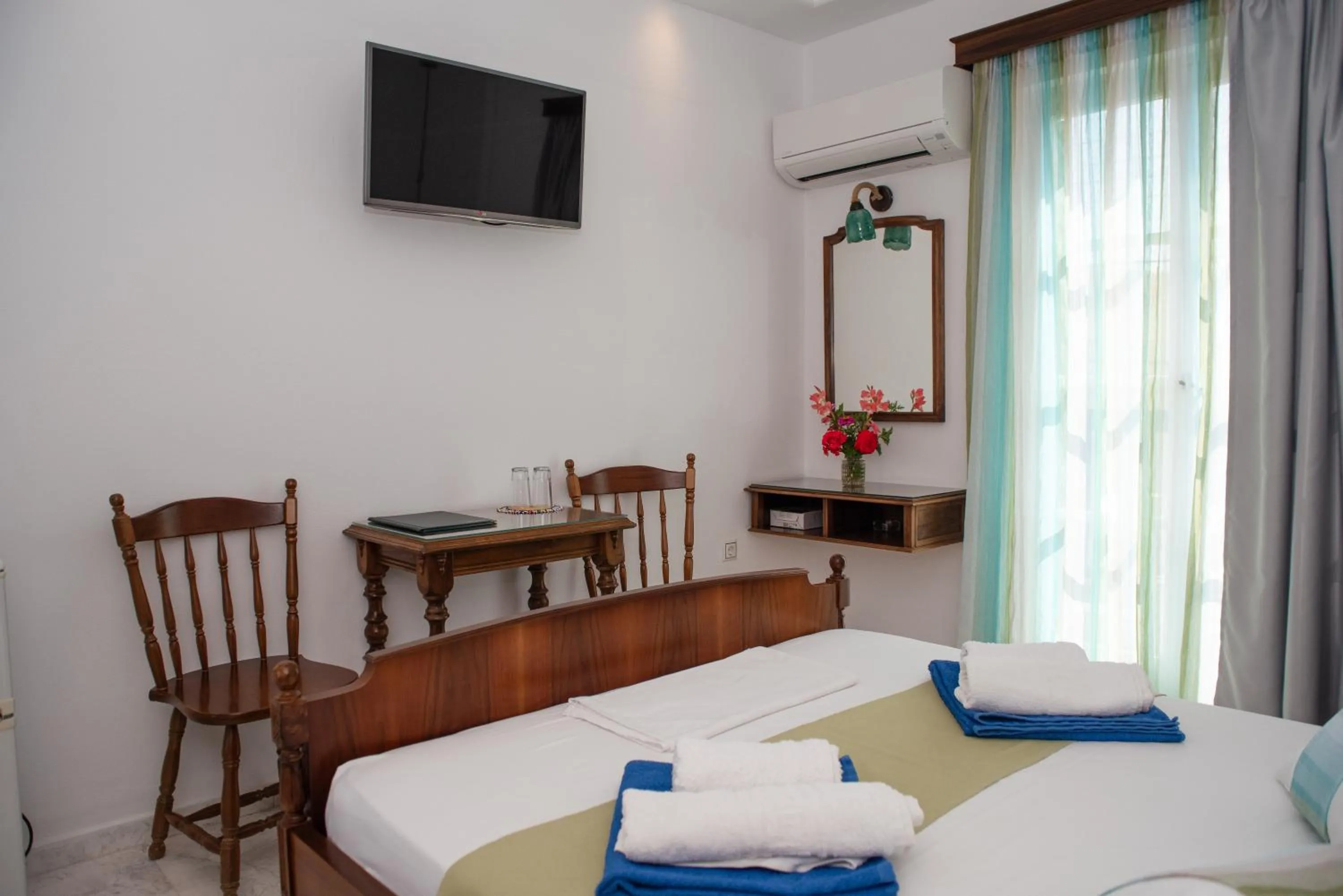 Bed in Adonis Hotel Naxos