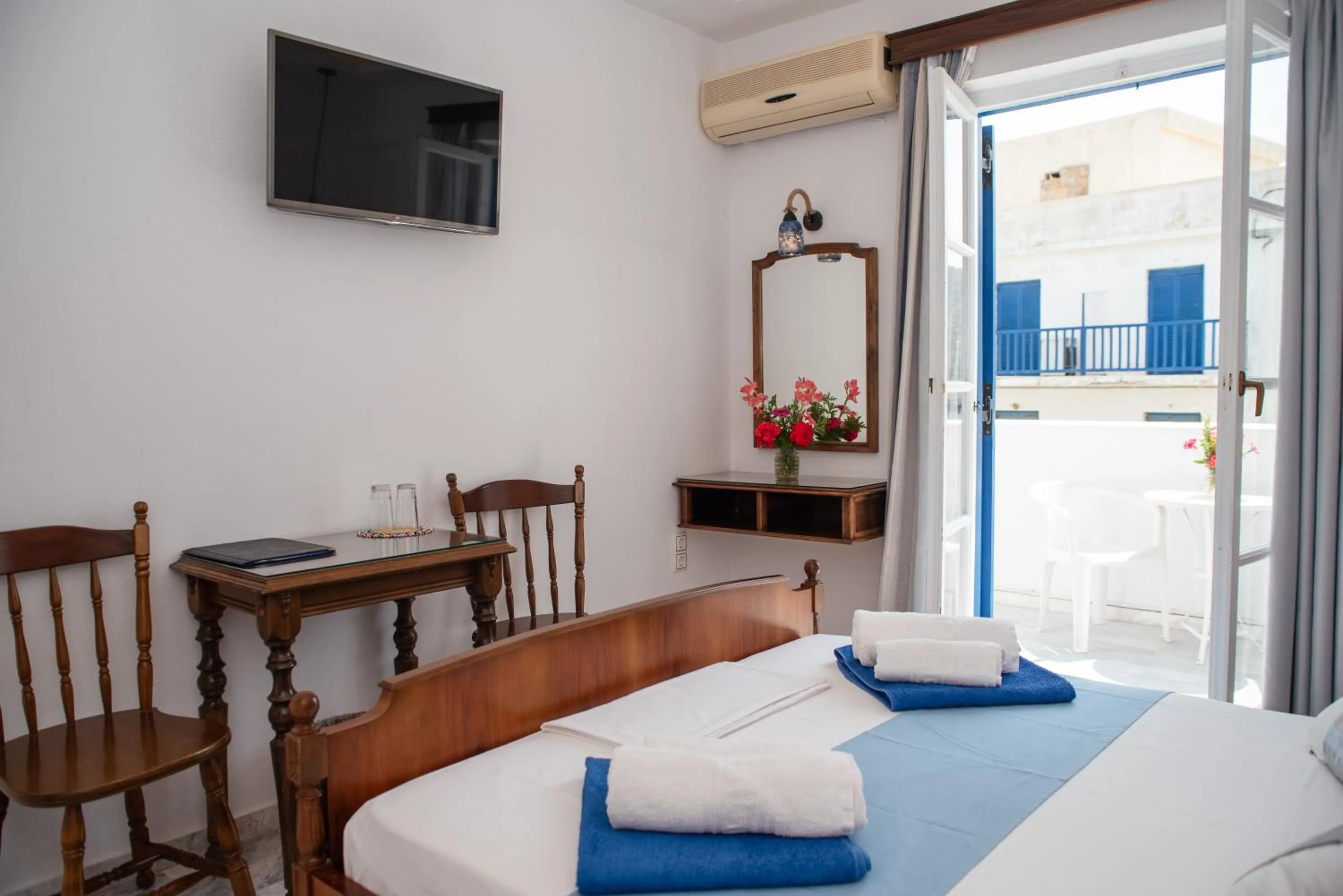 Bed in Adonis Hotel Naxos