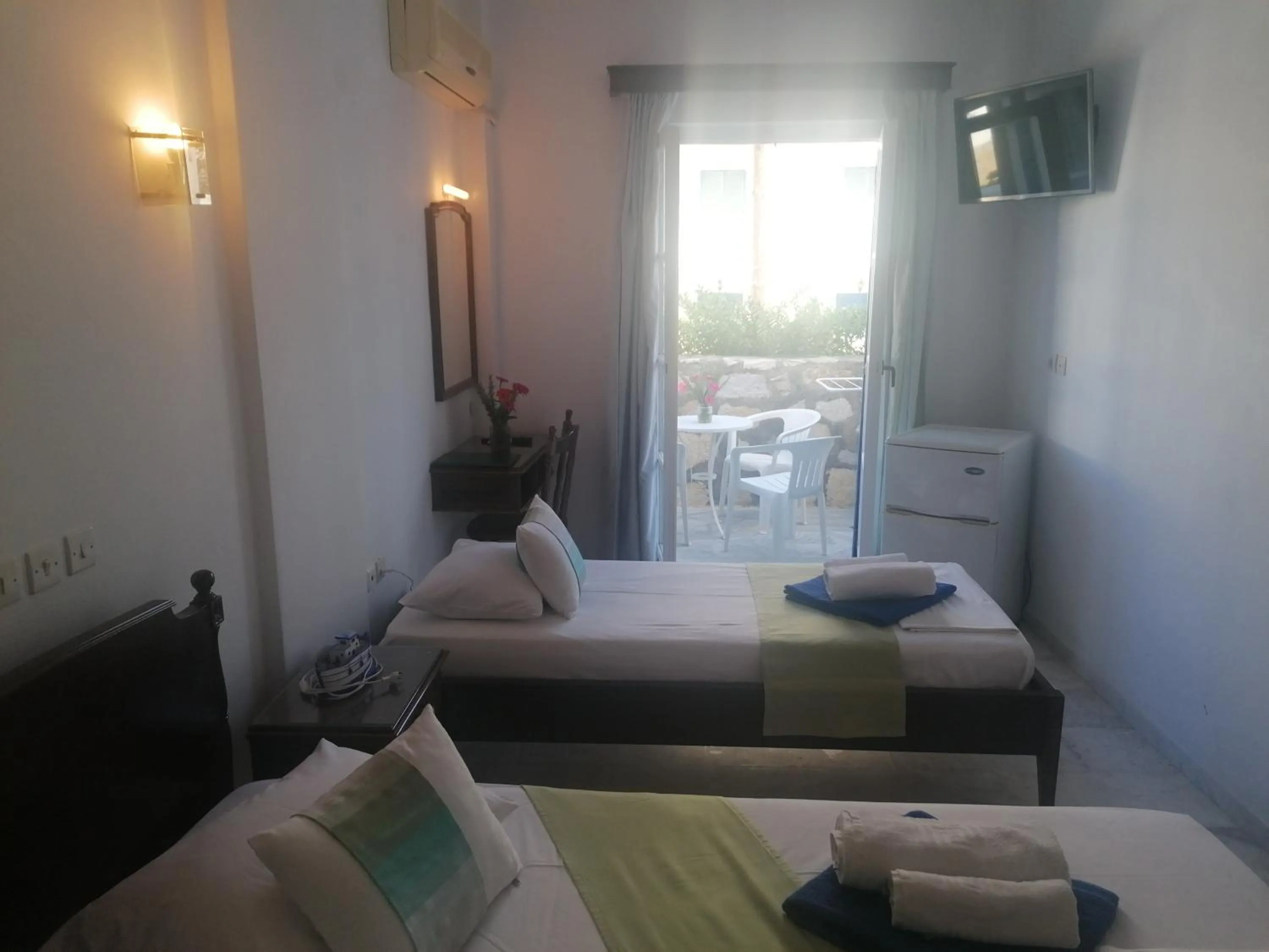 Bed in Adonis Hotel Naxos