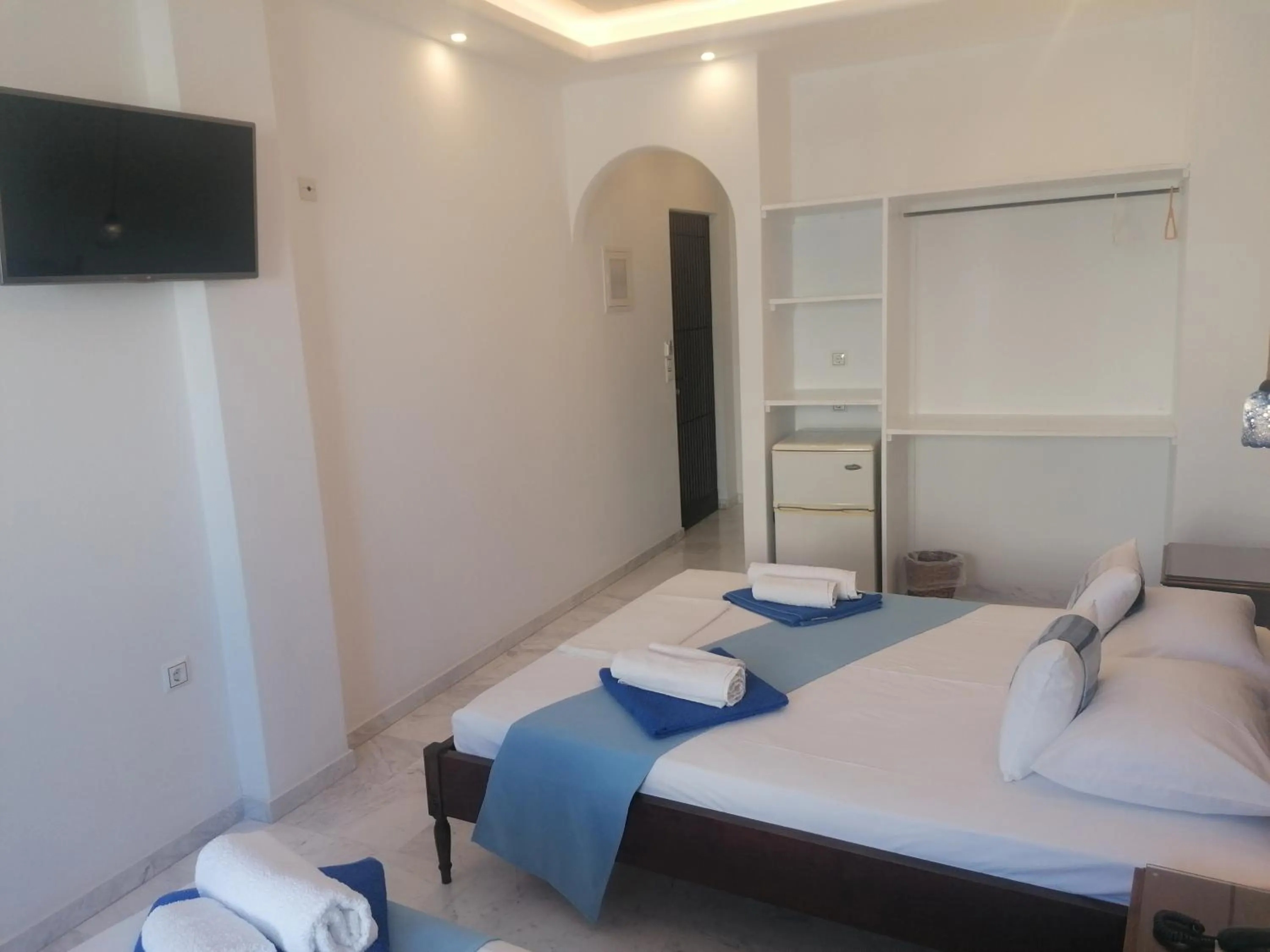 Bed in Adonis Hotel Naxos