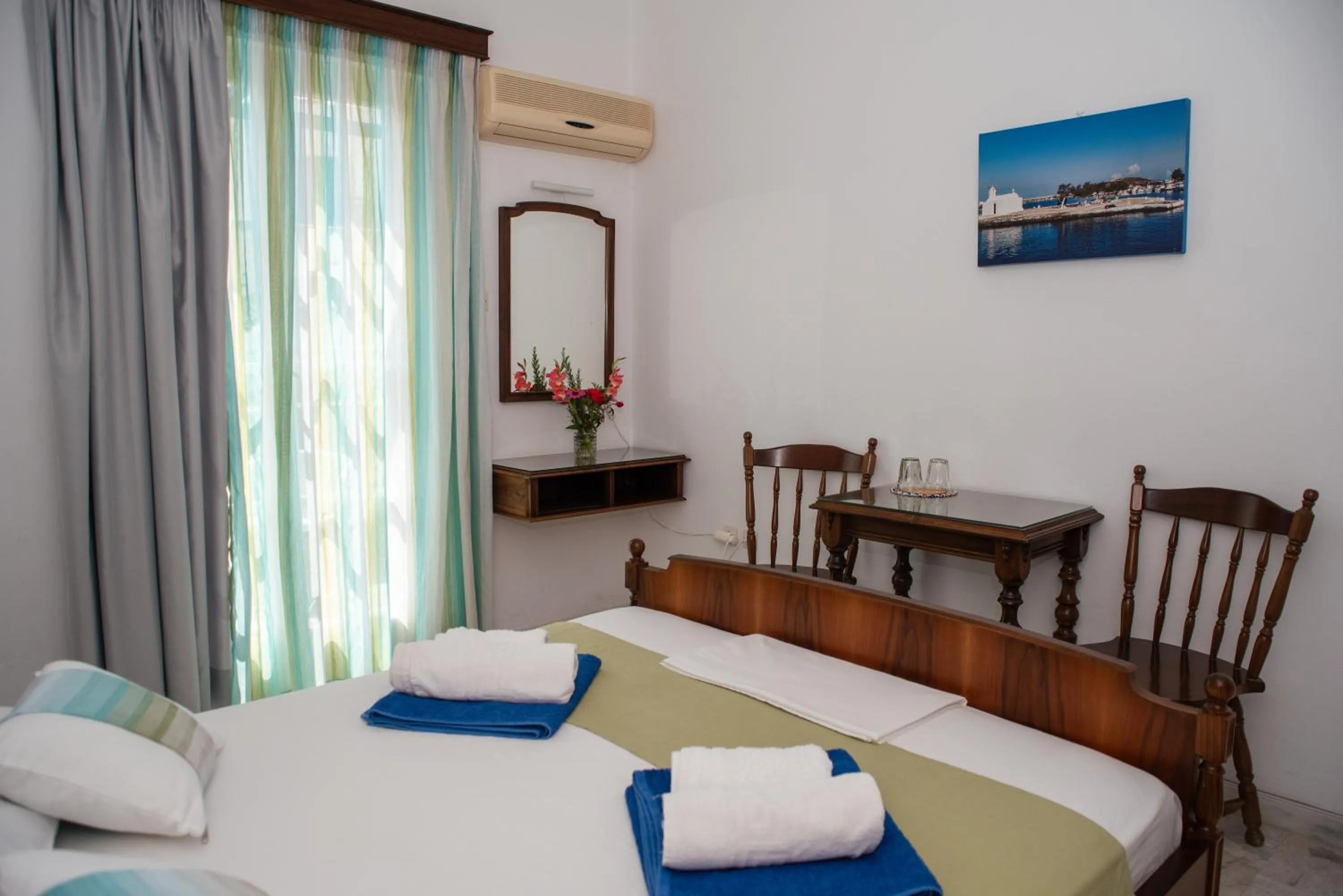 Bed in Adonis Hotel Naxos