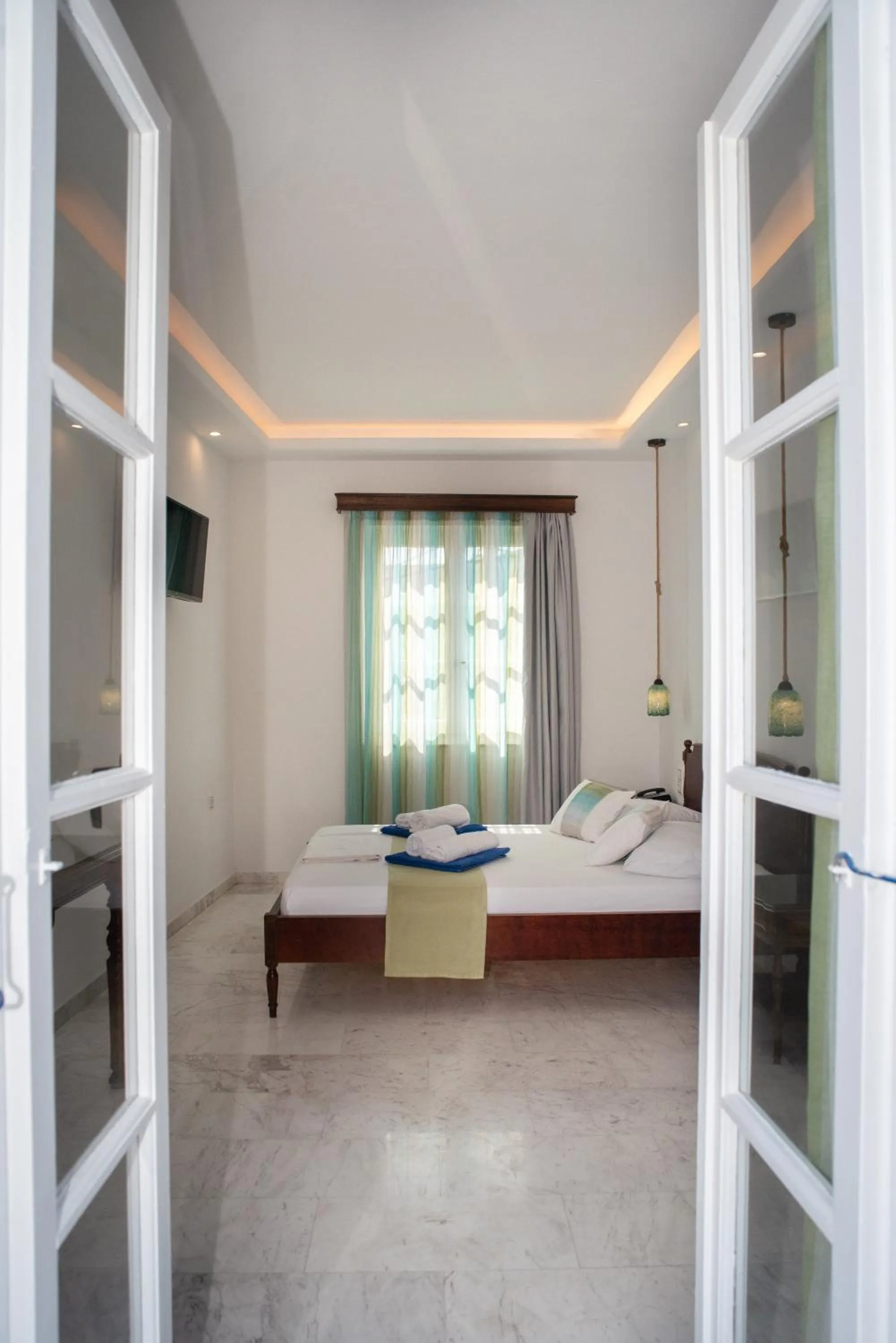 Bed in Adonis Hotel Naxos