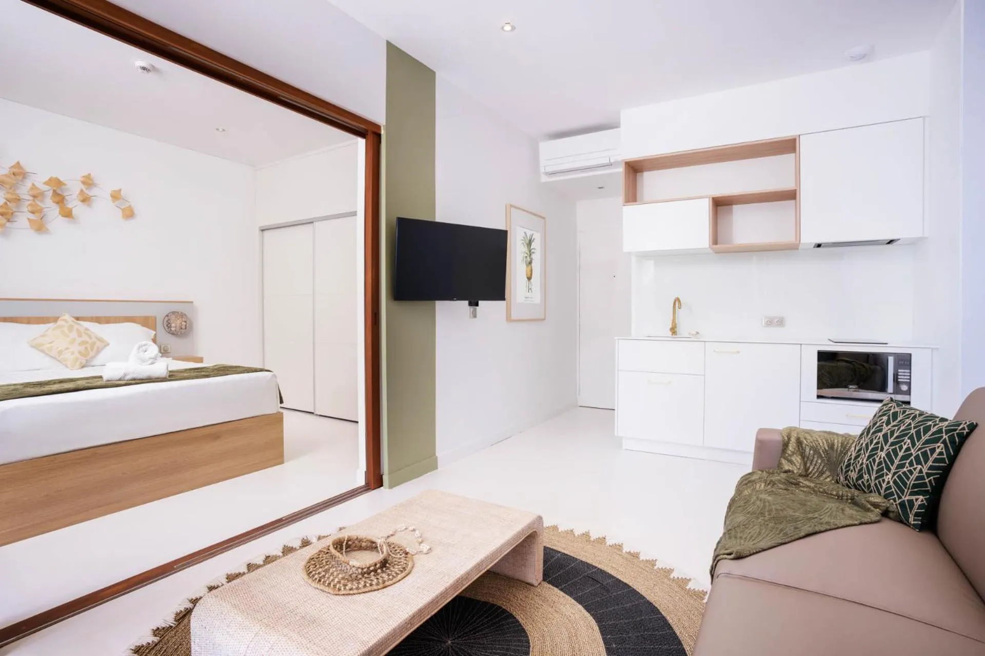 Bed in Cook's Bay Hotel & Suites