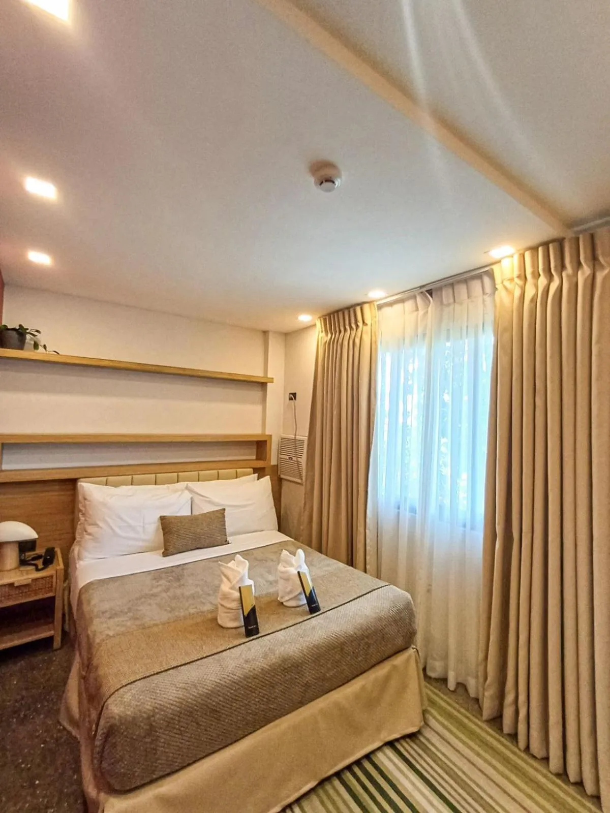 Bed in Prince Express Inn