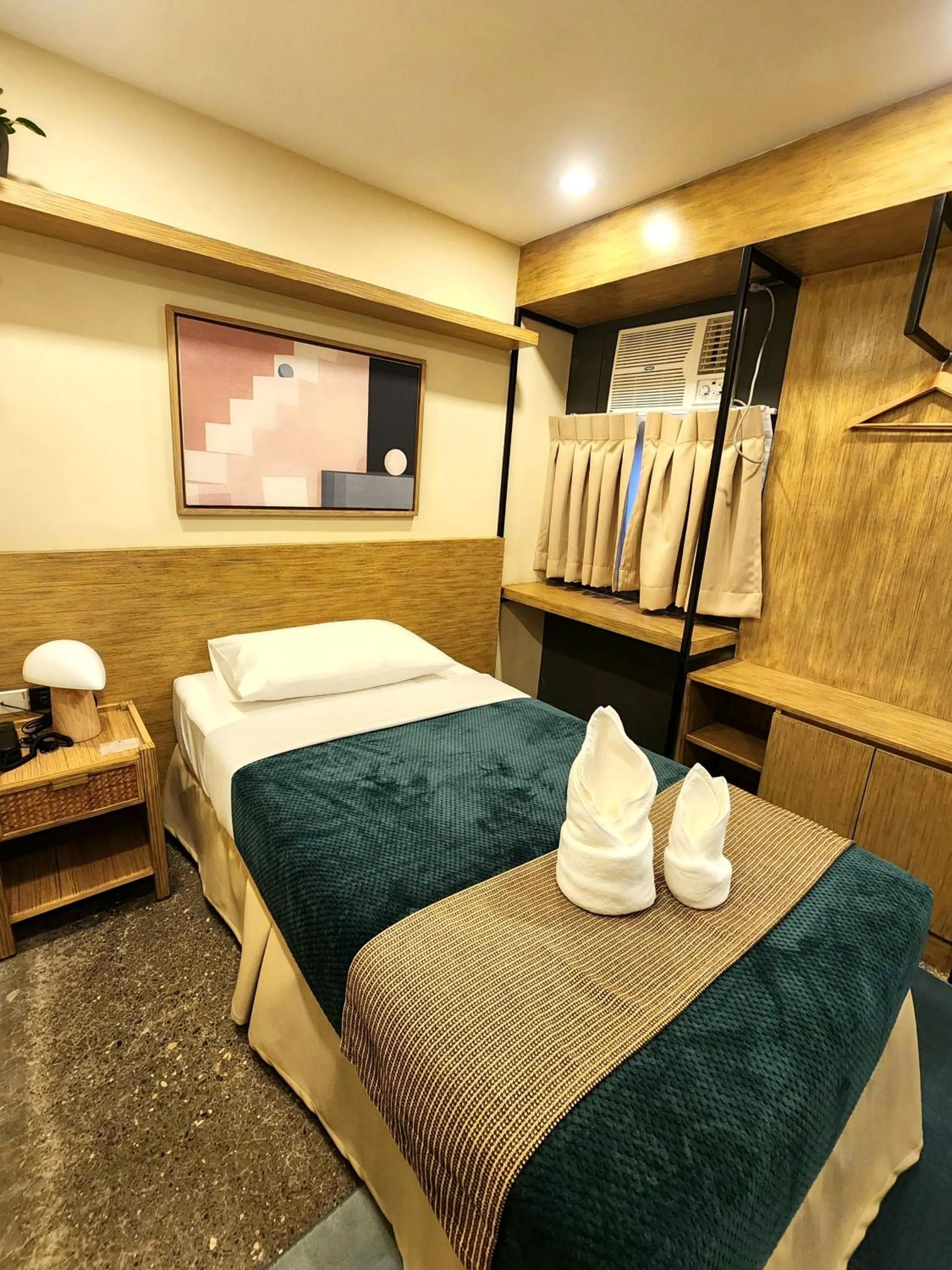 Bed in Prince Express Inn
