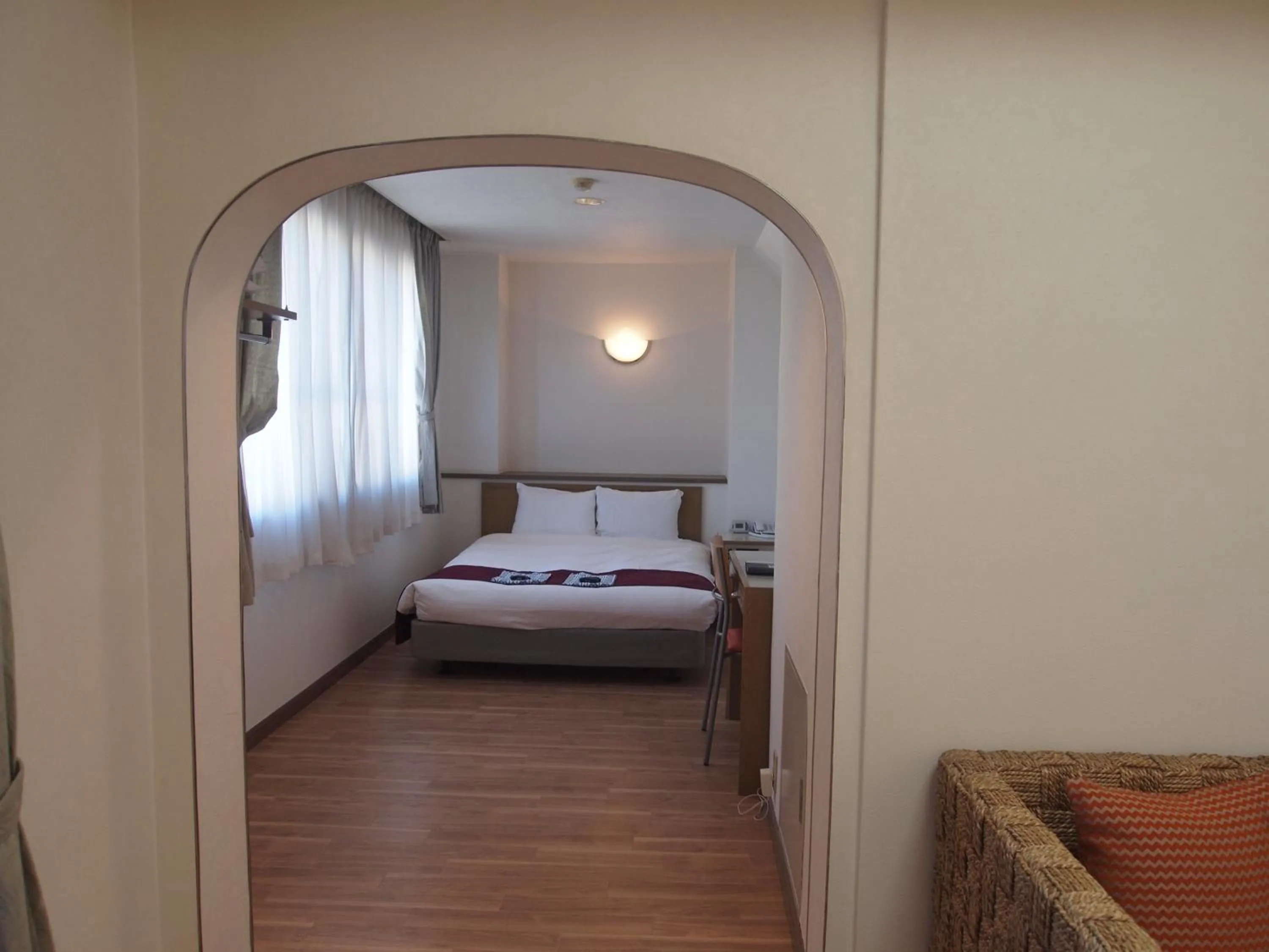 Photo of the whole room, Bed in Senkei Plaza