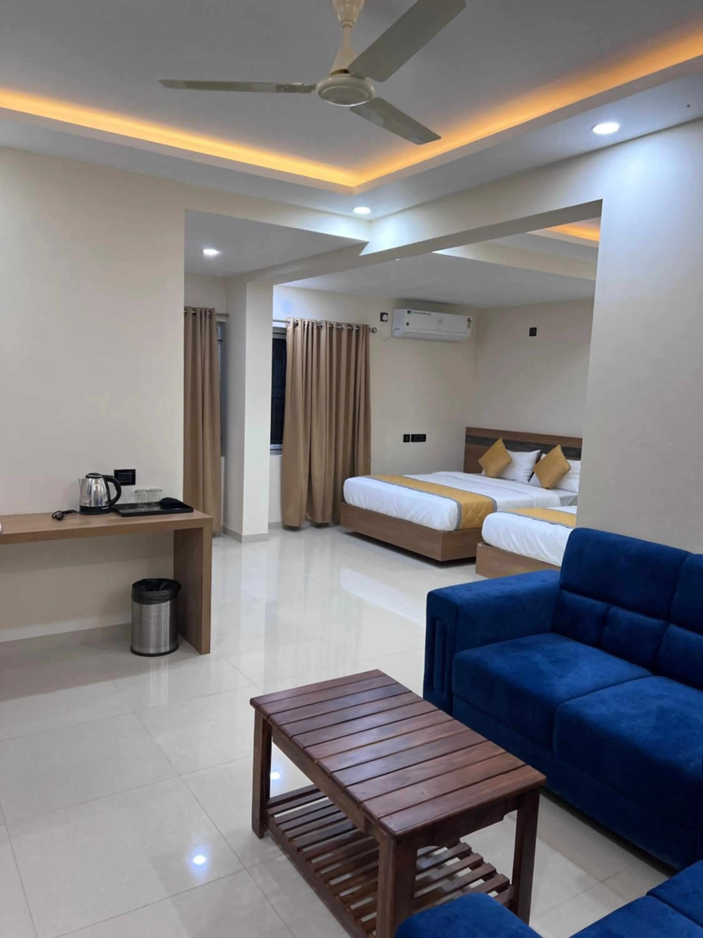 Living room, Bed in Hotel Mangalore Stay INN