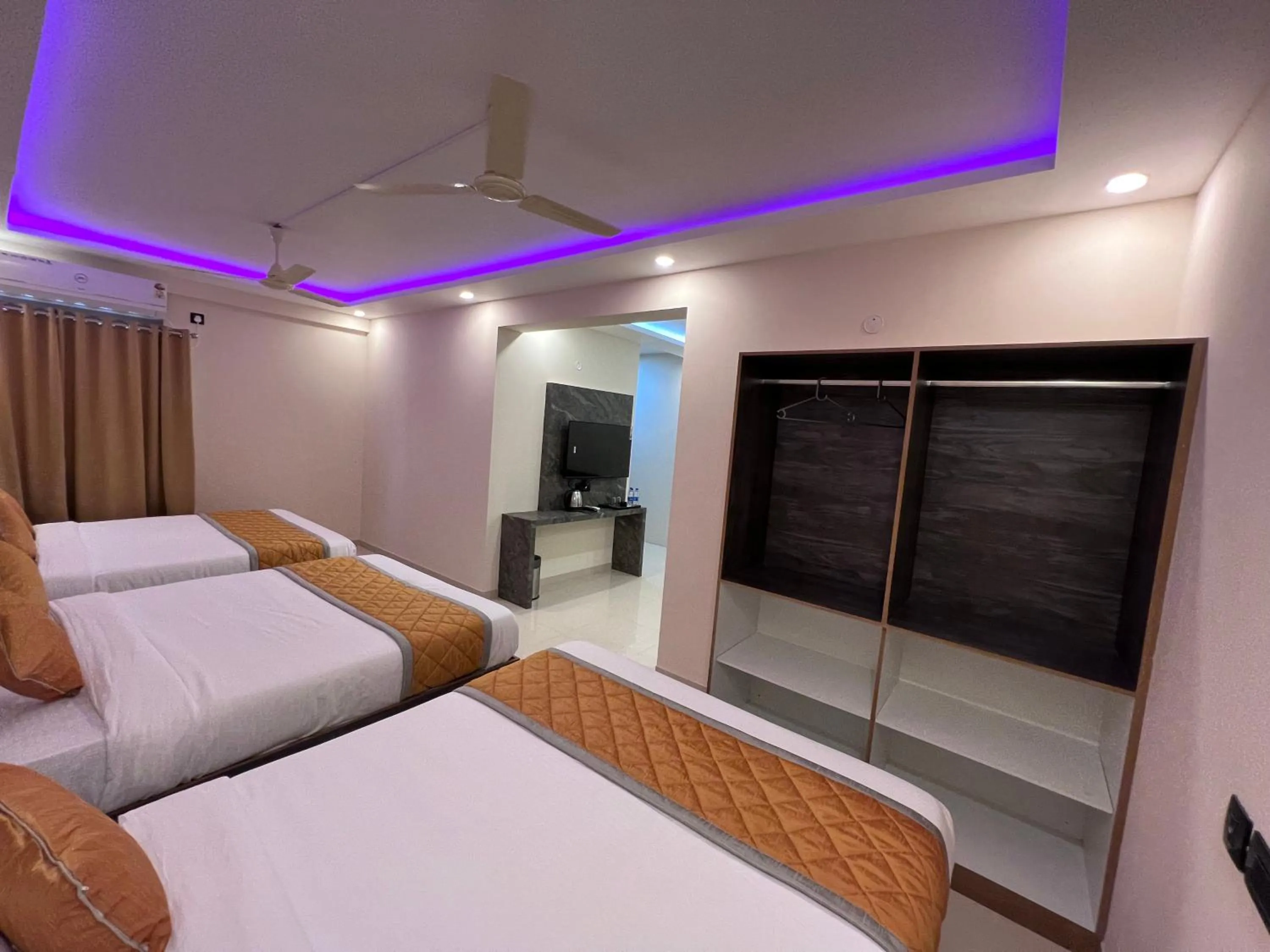 wardrobe, Bed in Hotel Mangalore Stay INN