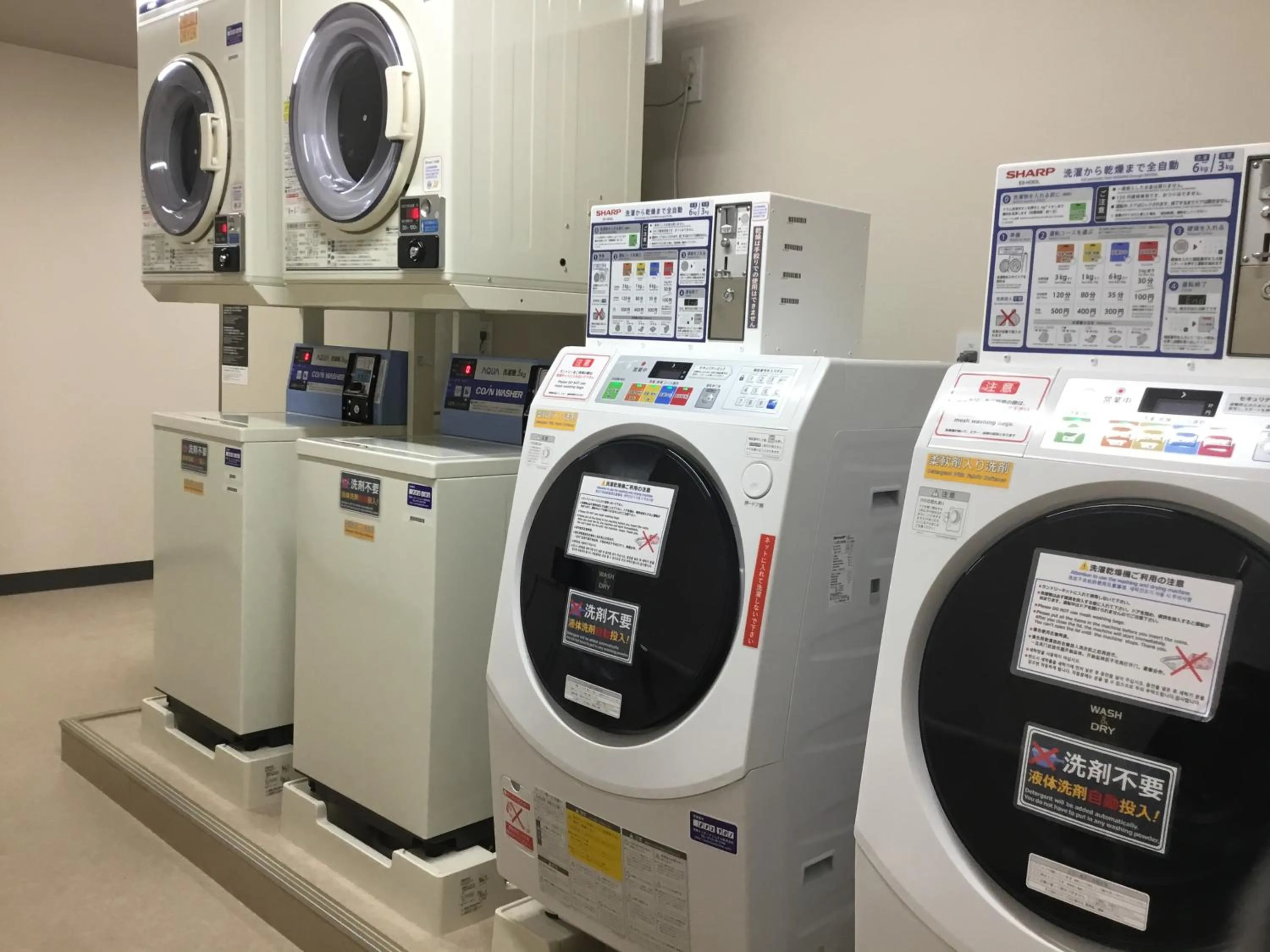 washing machine in Odysis Suites Osaka Airport Hotel