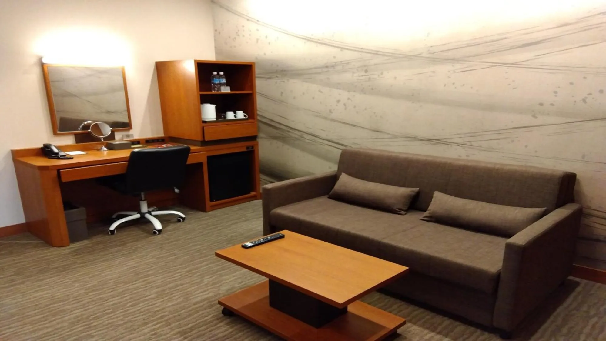 Living room in Odysis Suites Osaka Airport Hotel