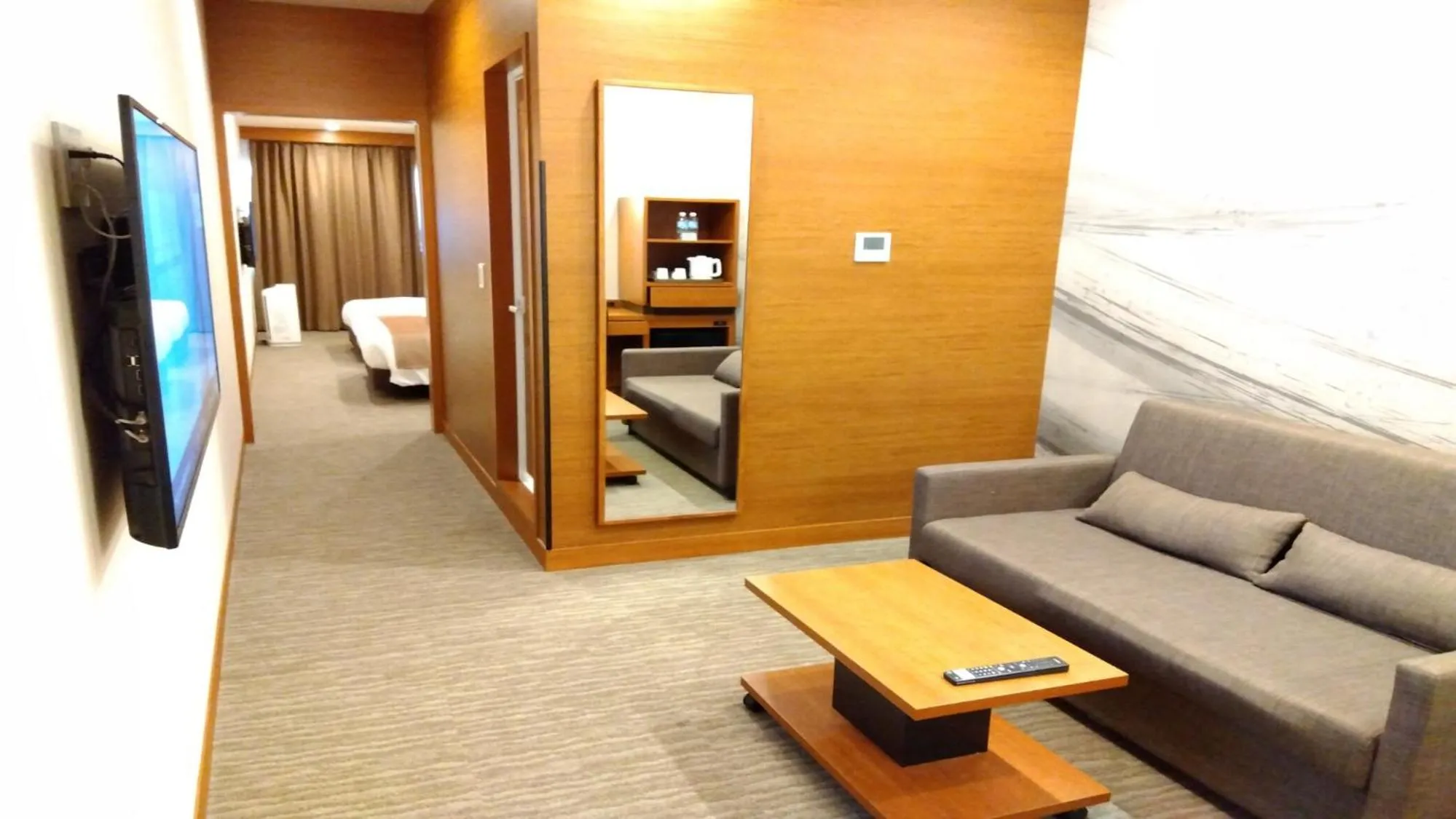 Living room in Odysis Suites Osaka Airport Hotel