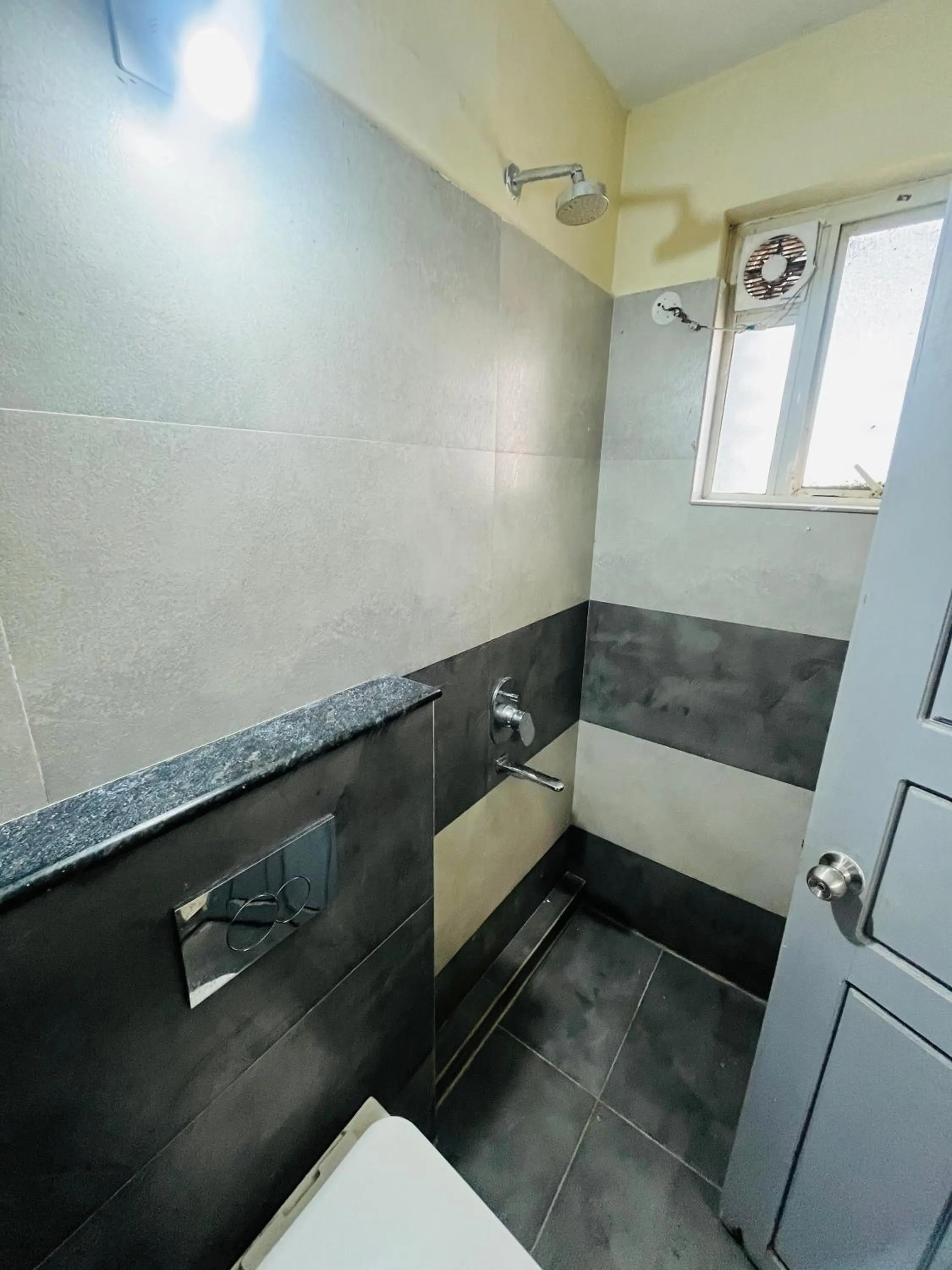 Shower in REGAL SUITES