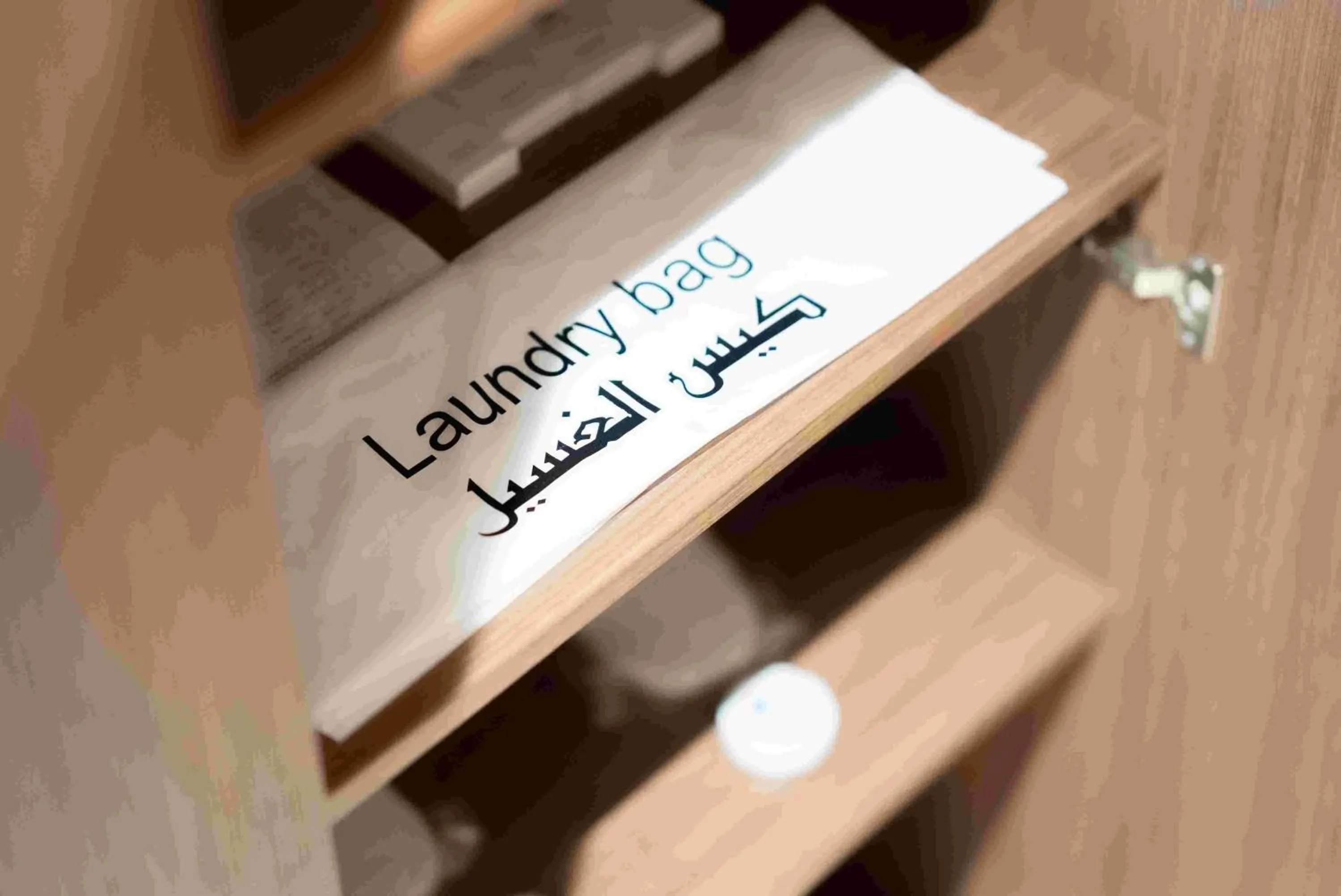 laundry in Three Pearls Musalli Hotel