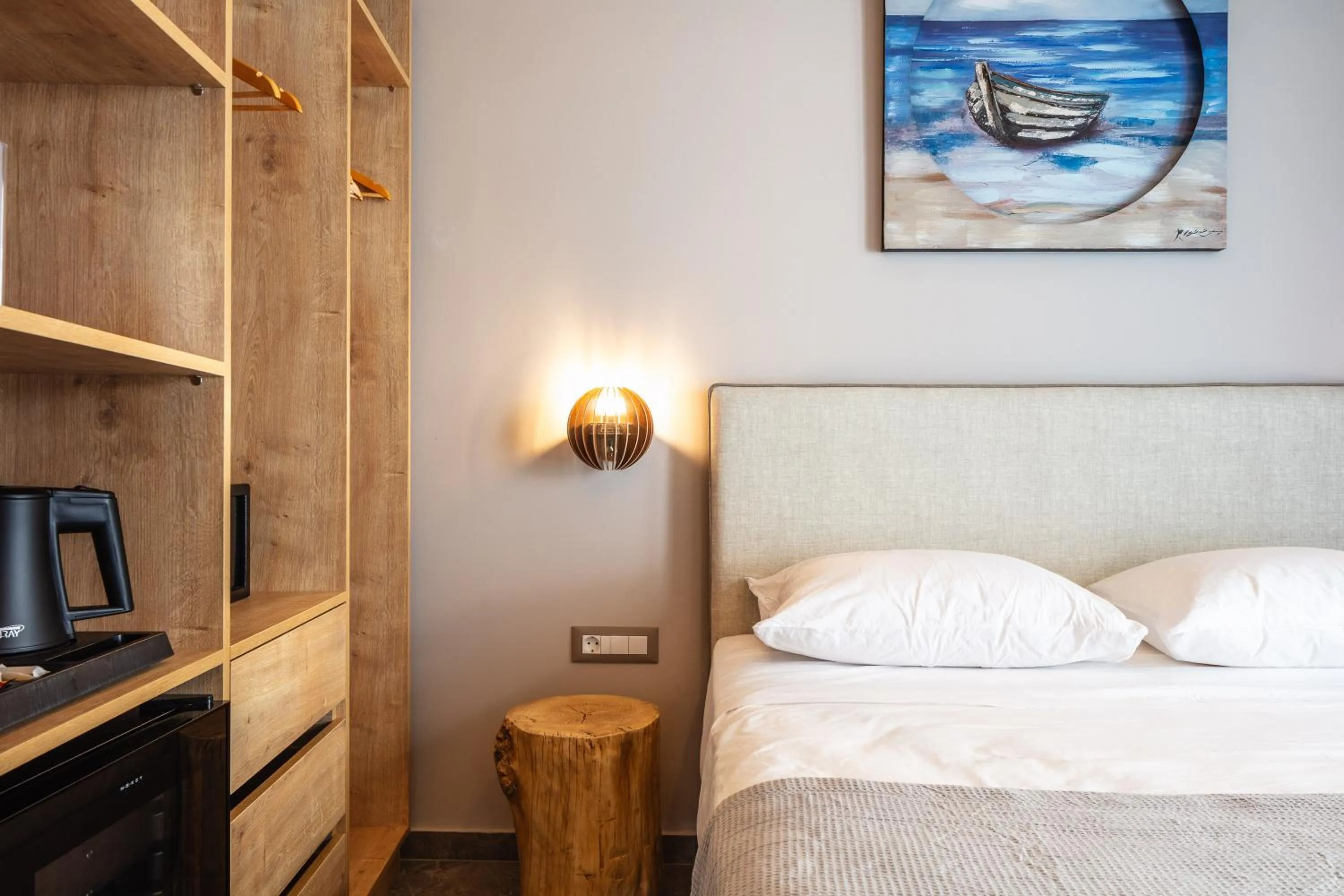 Bed in Skipper Beachfront Suites