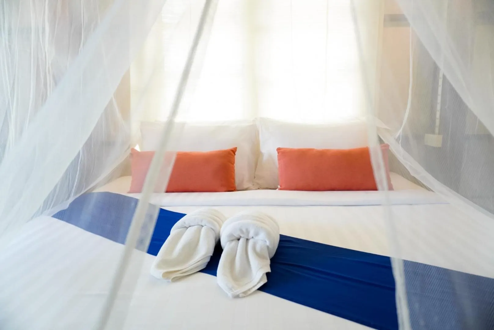 Bed in Baan Thong Ching Resort