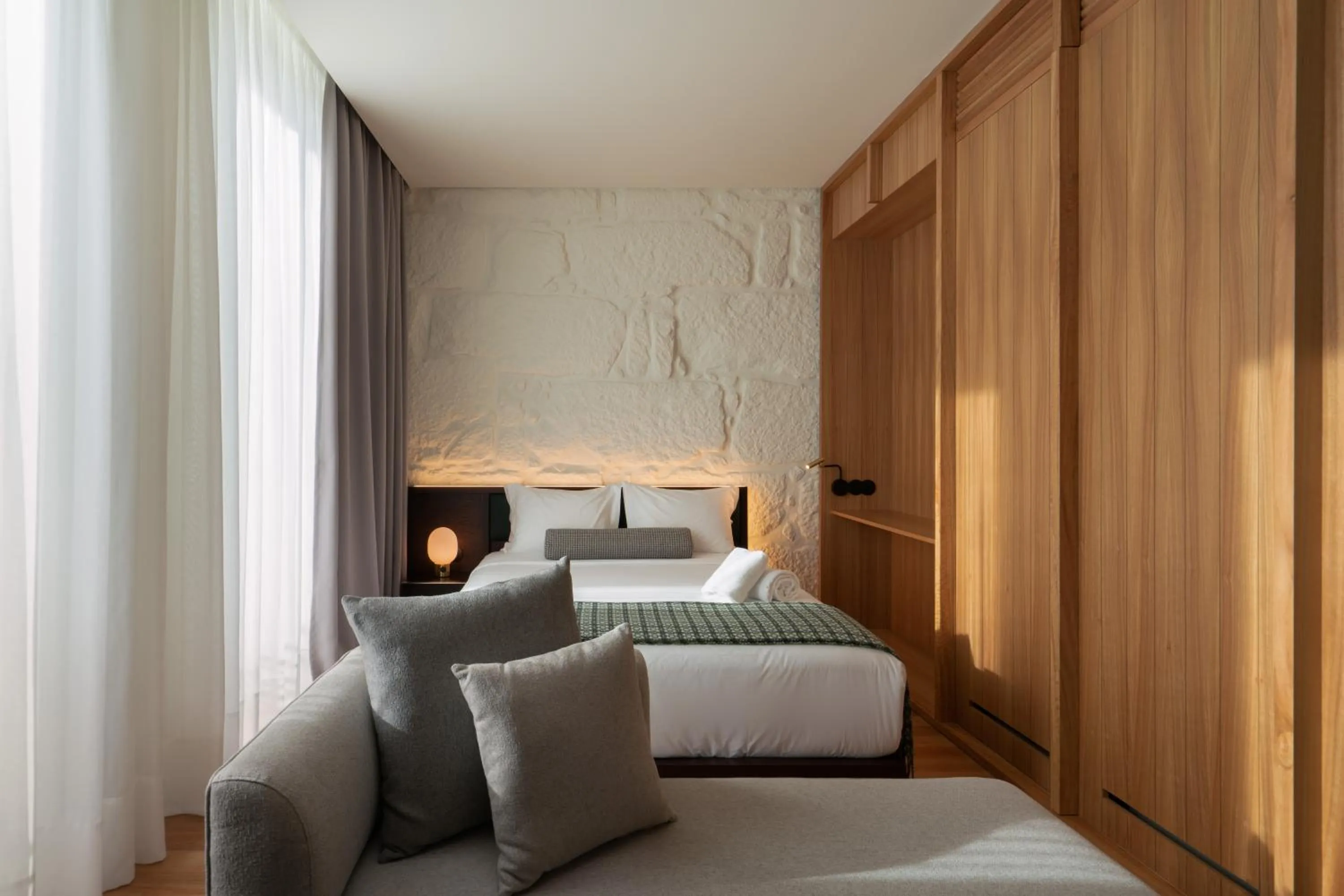 Bedroom in d'ALMA Boutique Hotel