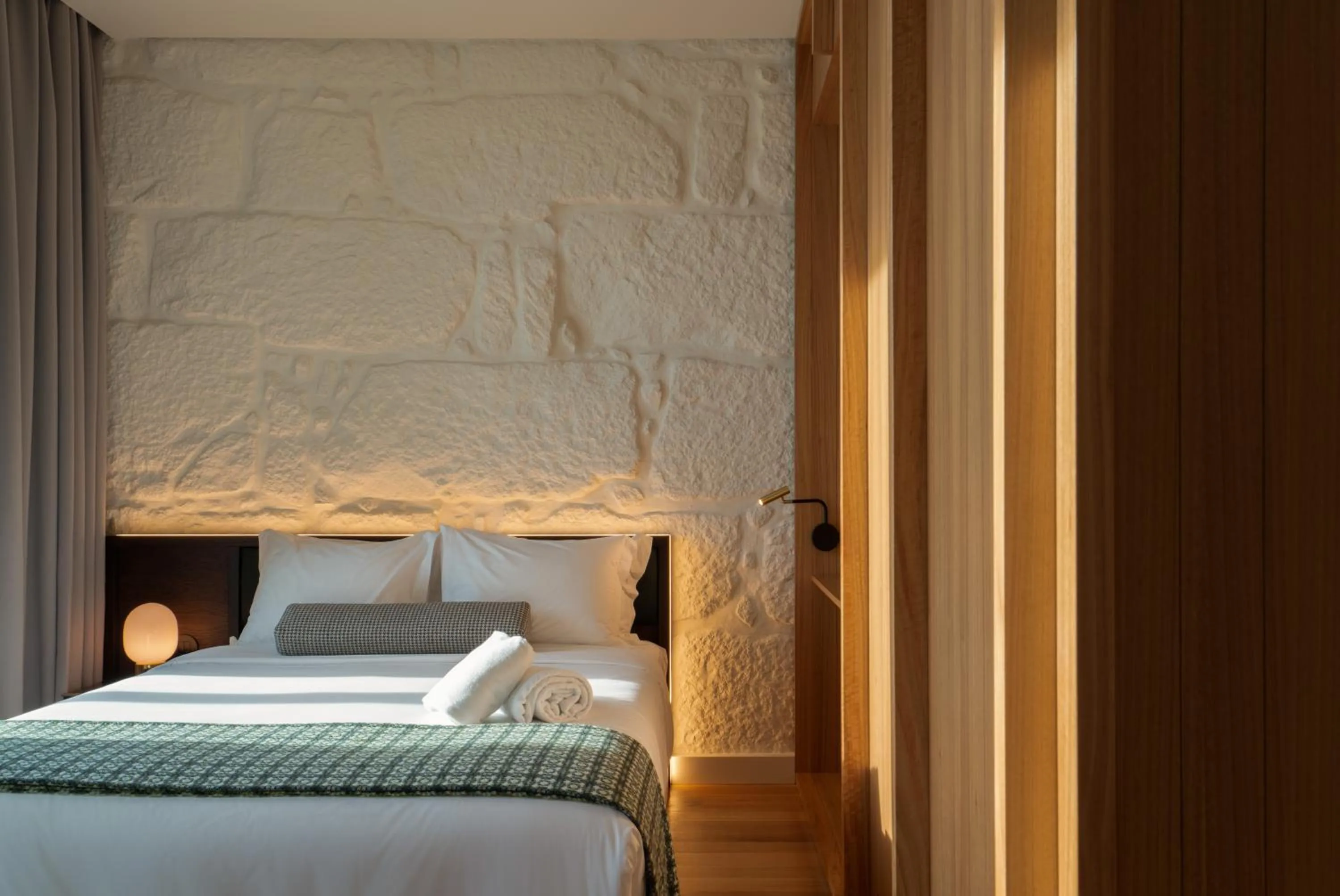 Bedroom in d'ALMA Boutique Hotel