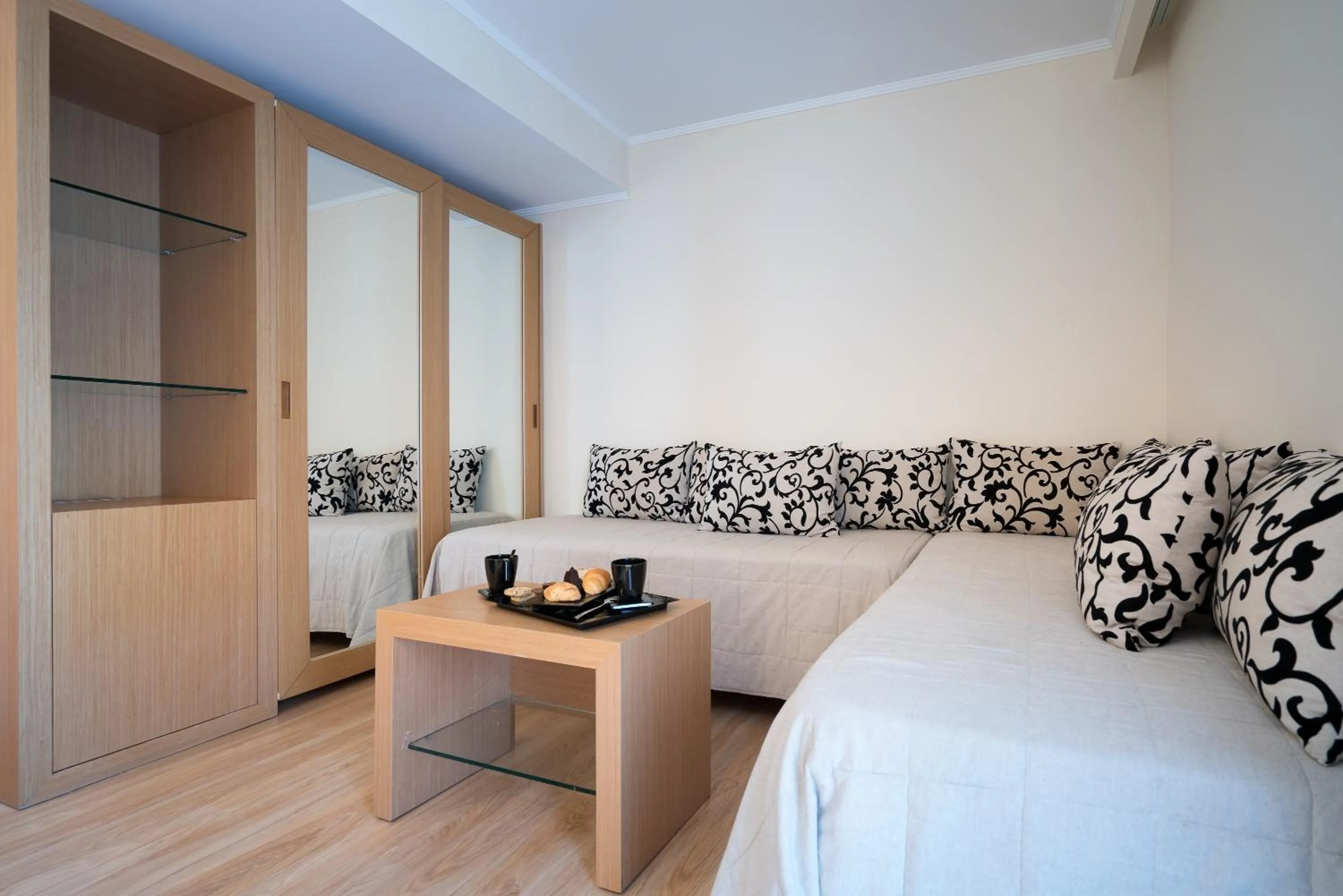 Seating area, Bed in Galaxy Beach Resort BW Premier Collection