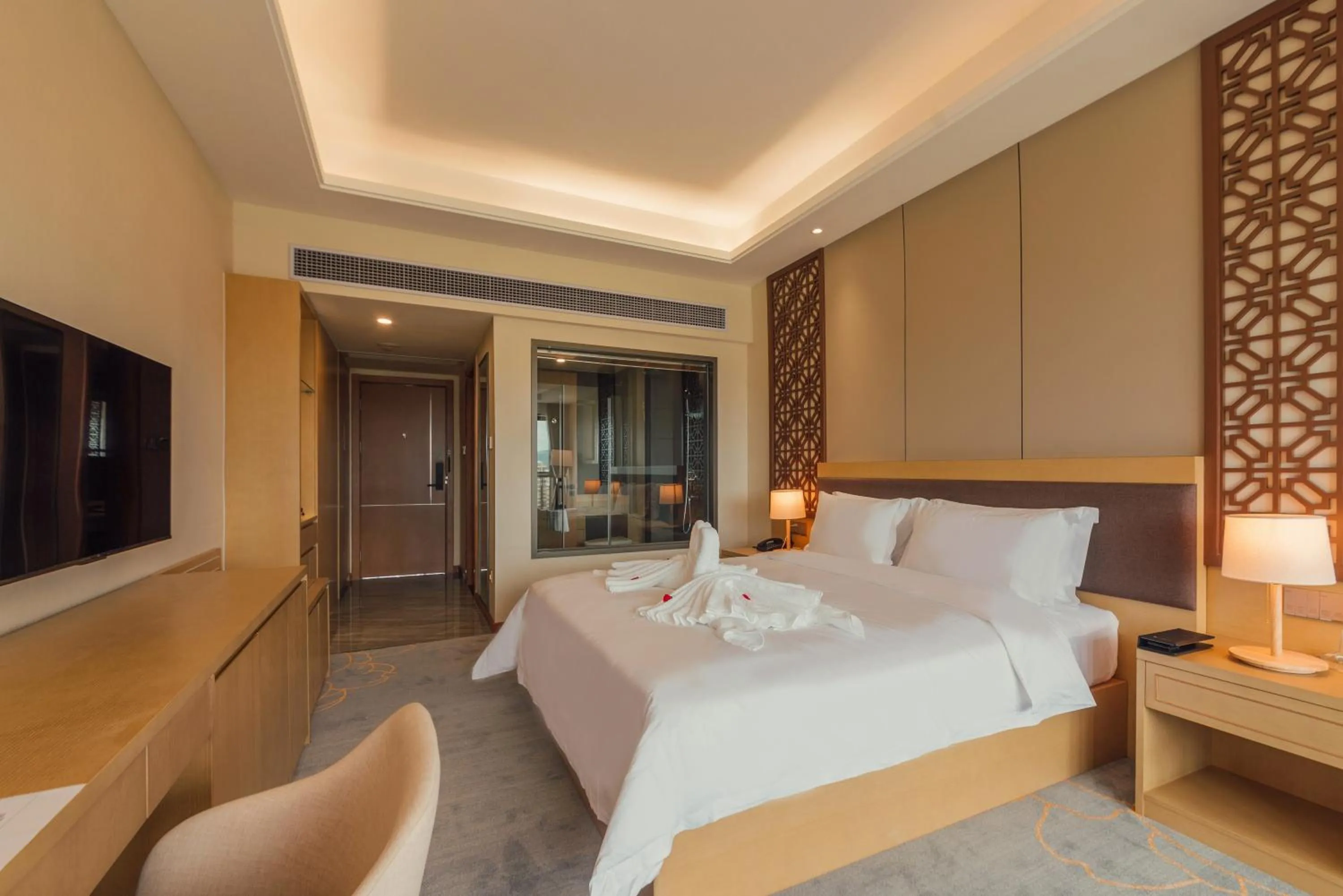 Bed in White Swan Guest House MeiZhou