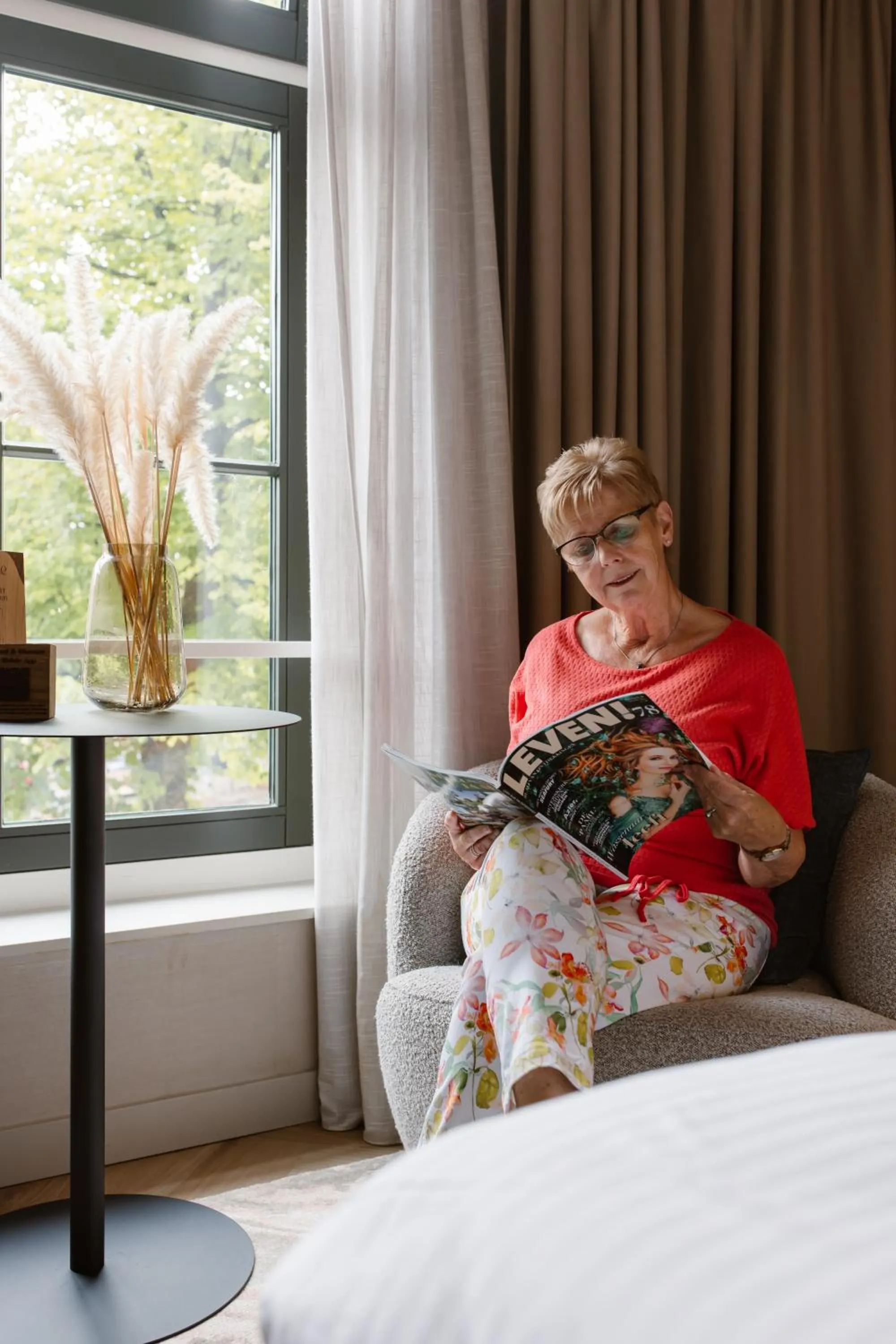 Seating area, Bed in Breathe Boutique Hotel