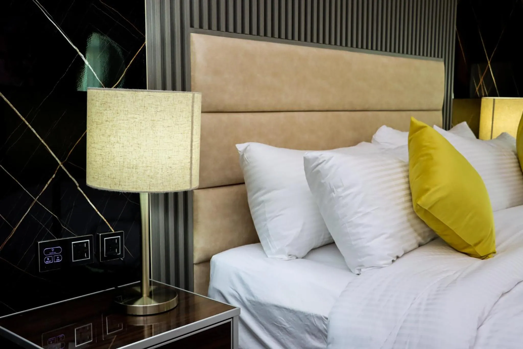 Bed in The RN Hotels