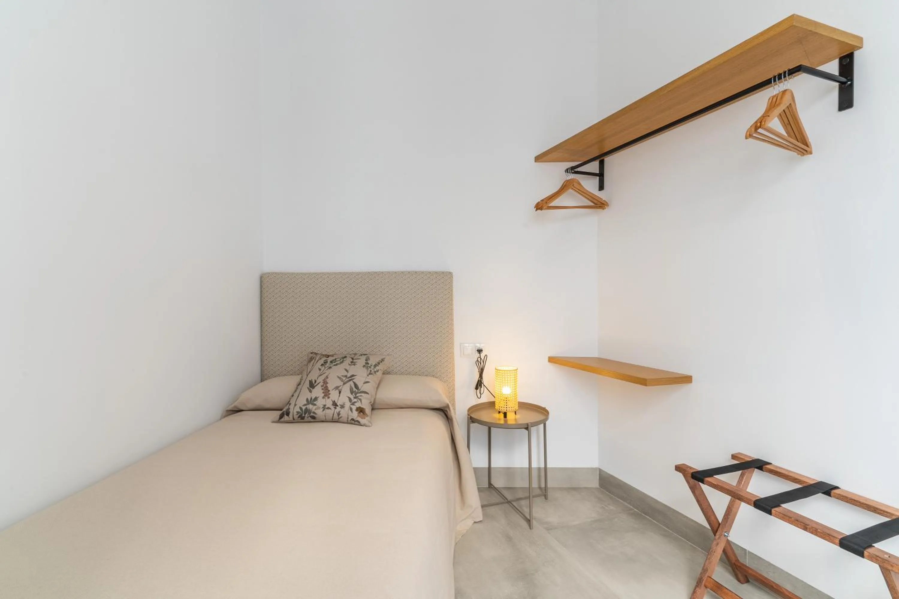 Bed in CASA DE LA VEGA SUITES