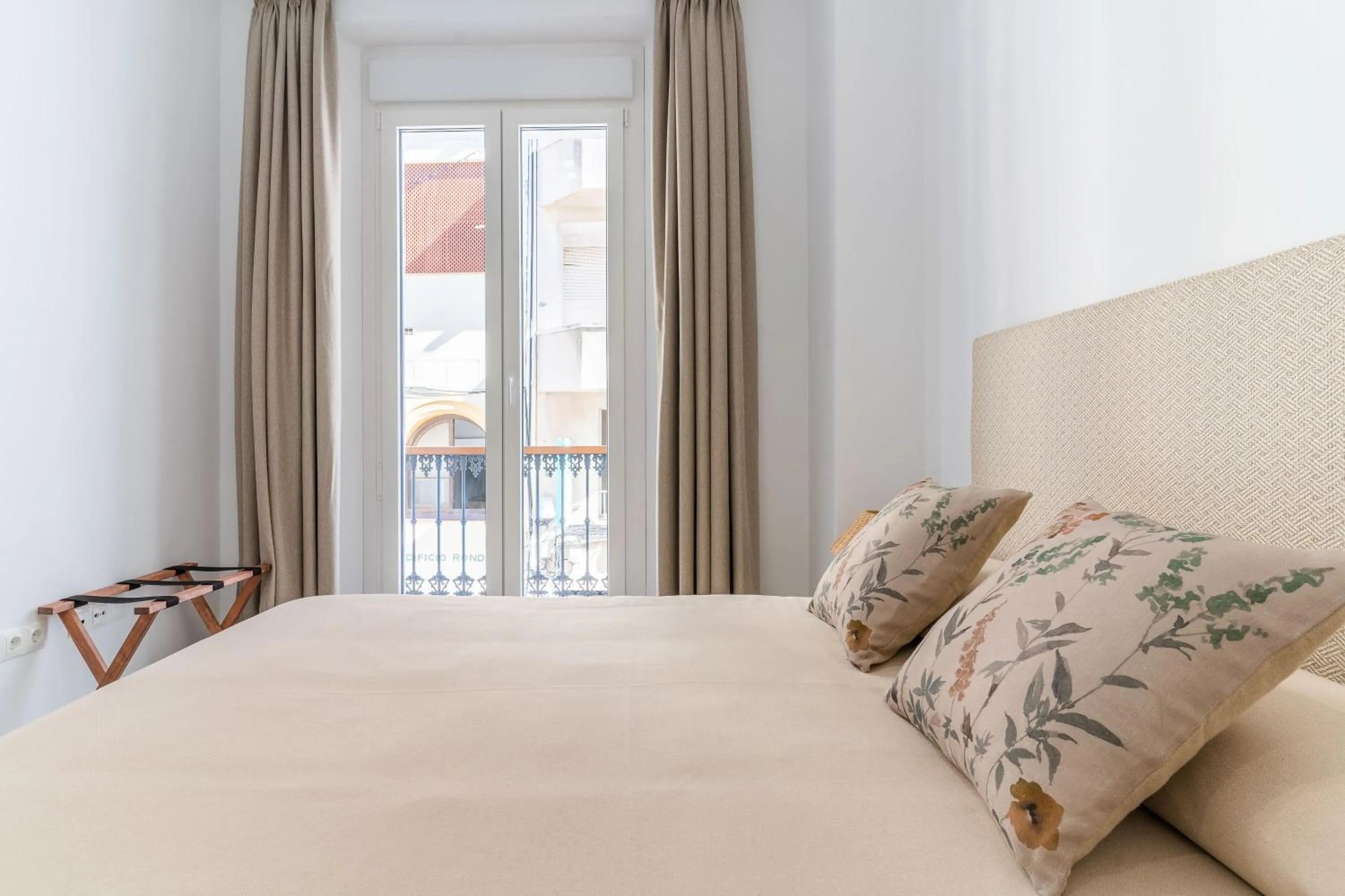 Bed in CASA DE LA VEGA SUITES