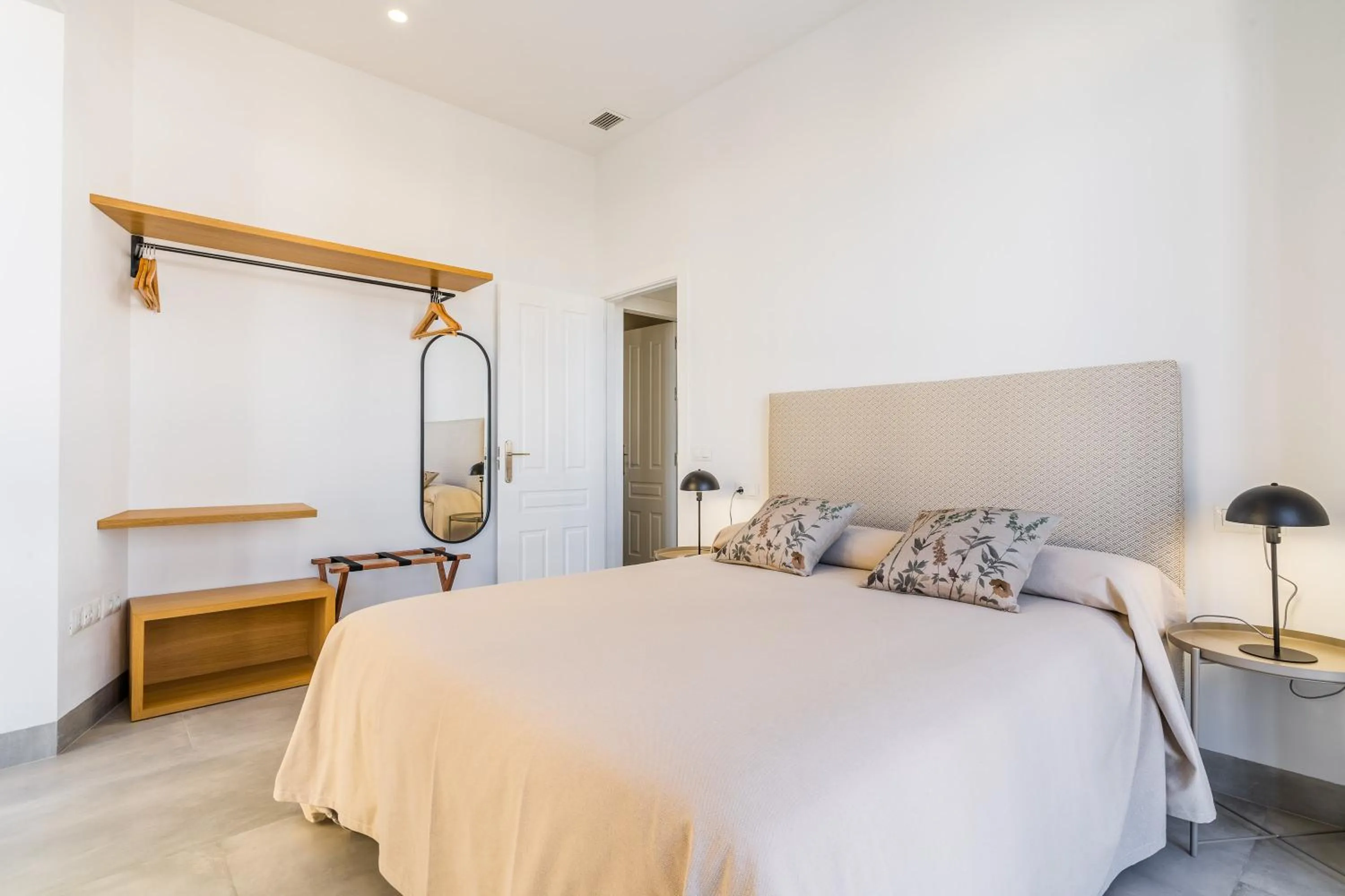 Bed in CASA DE LA VEGA SUITES