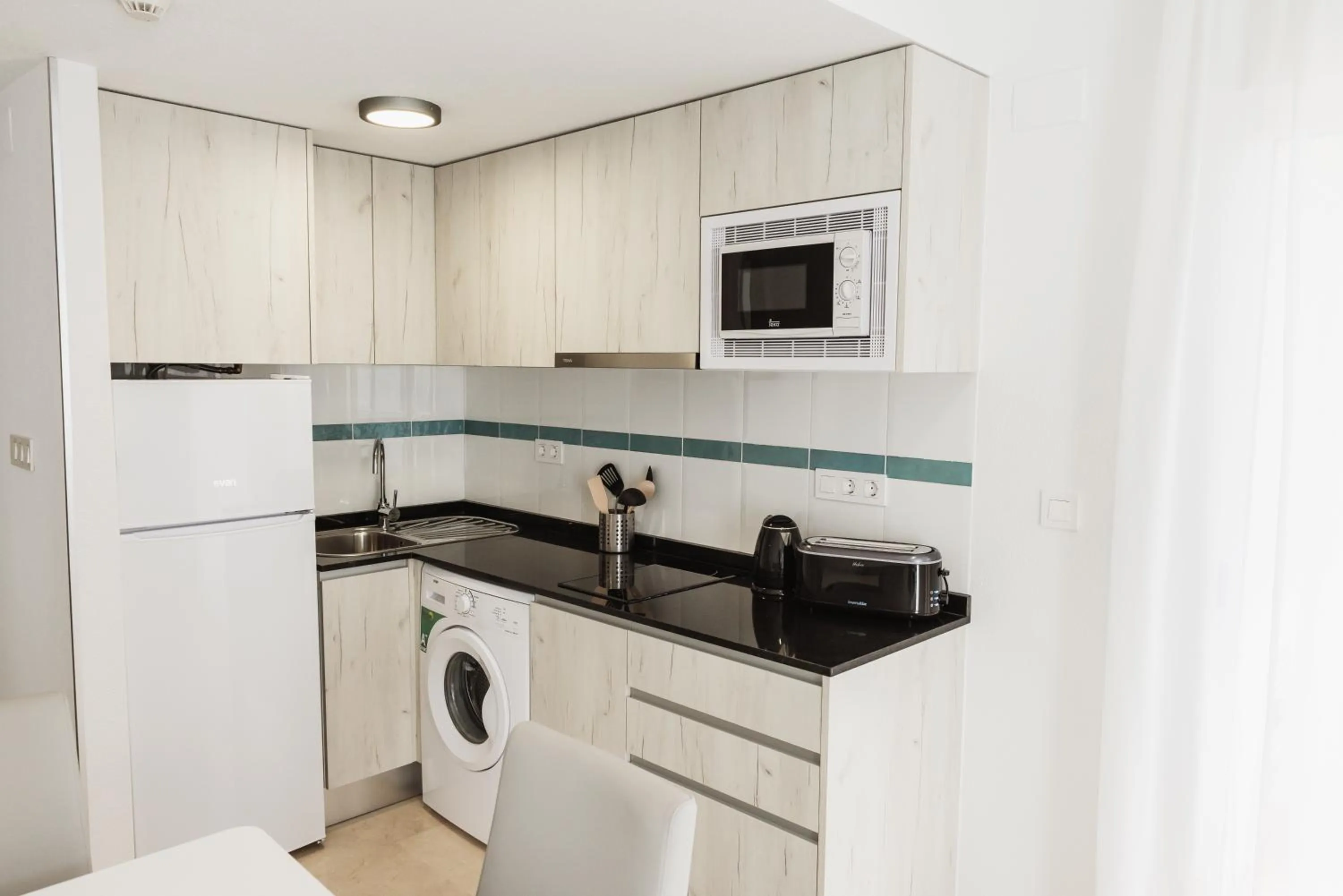 Kitchen or kitchenette in Nacavi Albir Aparthotel