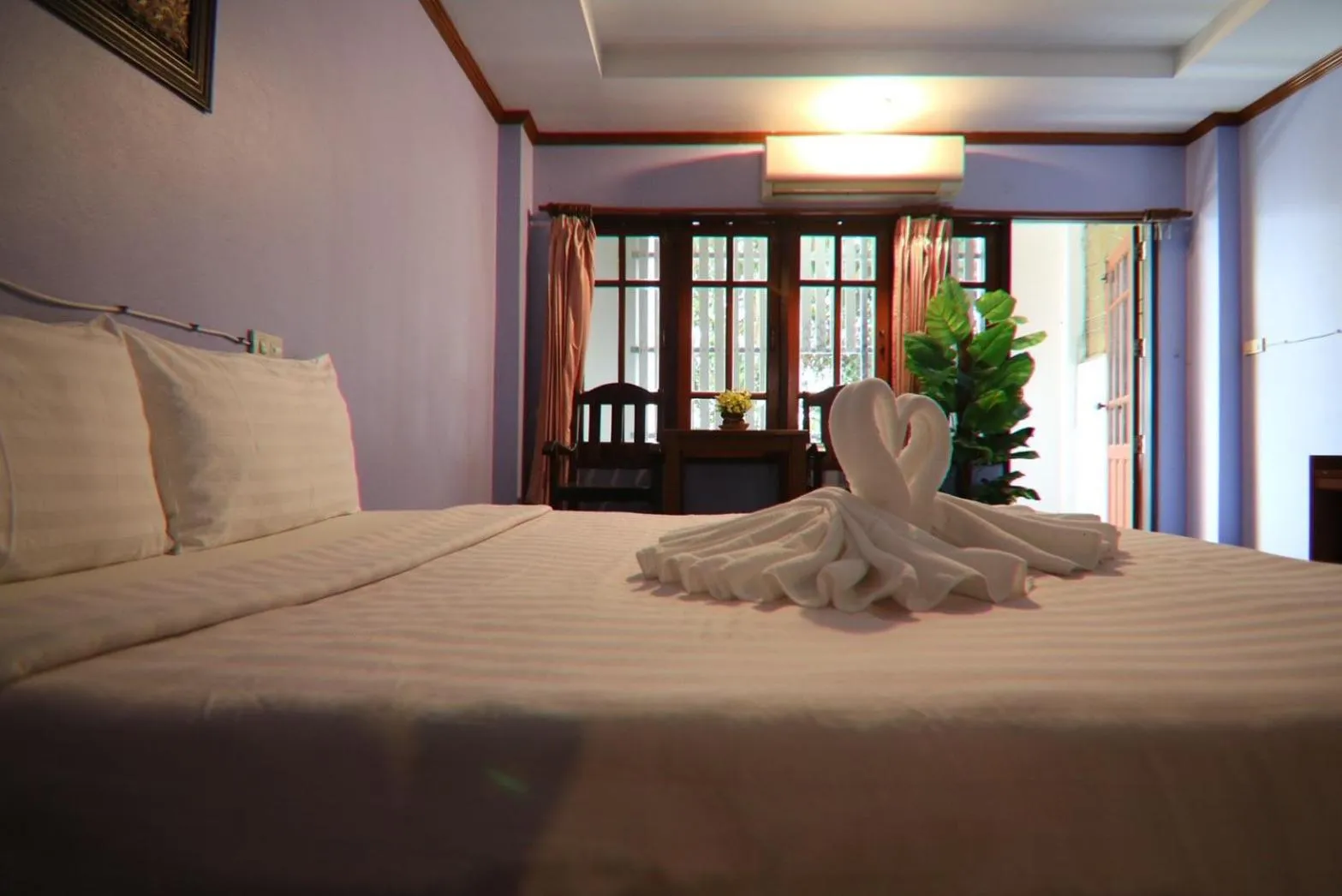 Bed in Coconut House Resort