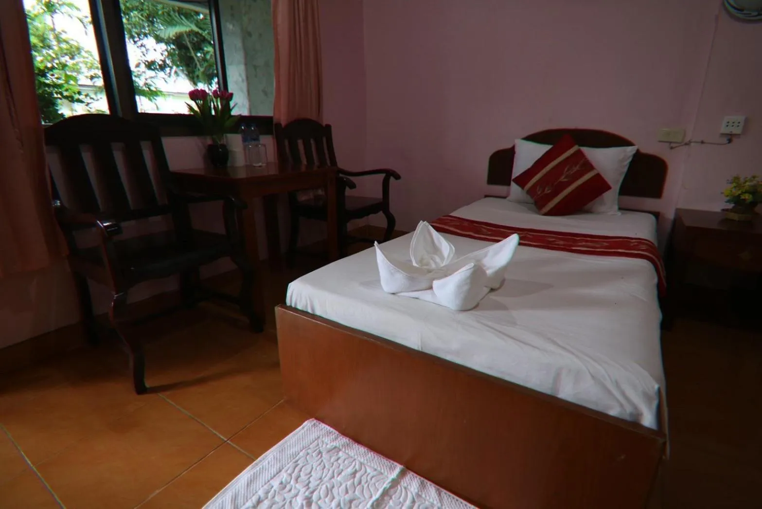 Bed in Coconut House Resort