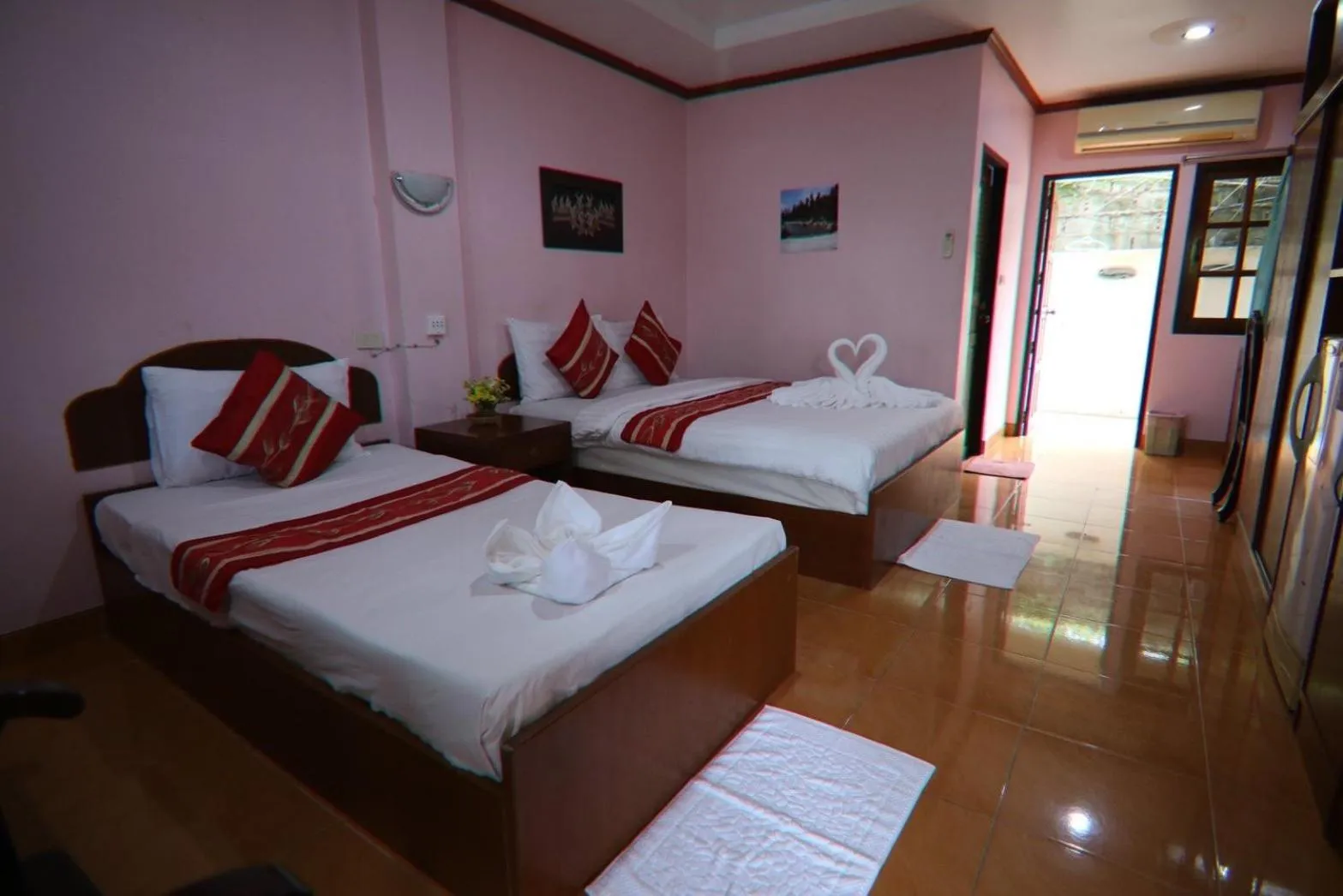 Bed in Coconut House Resort