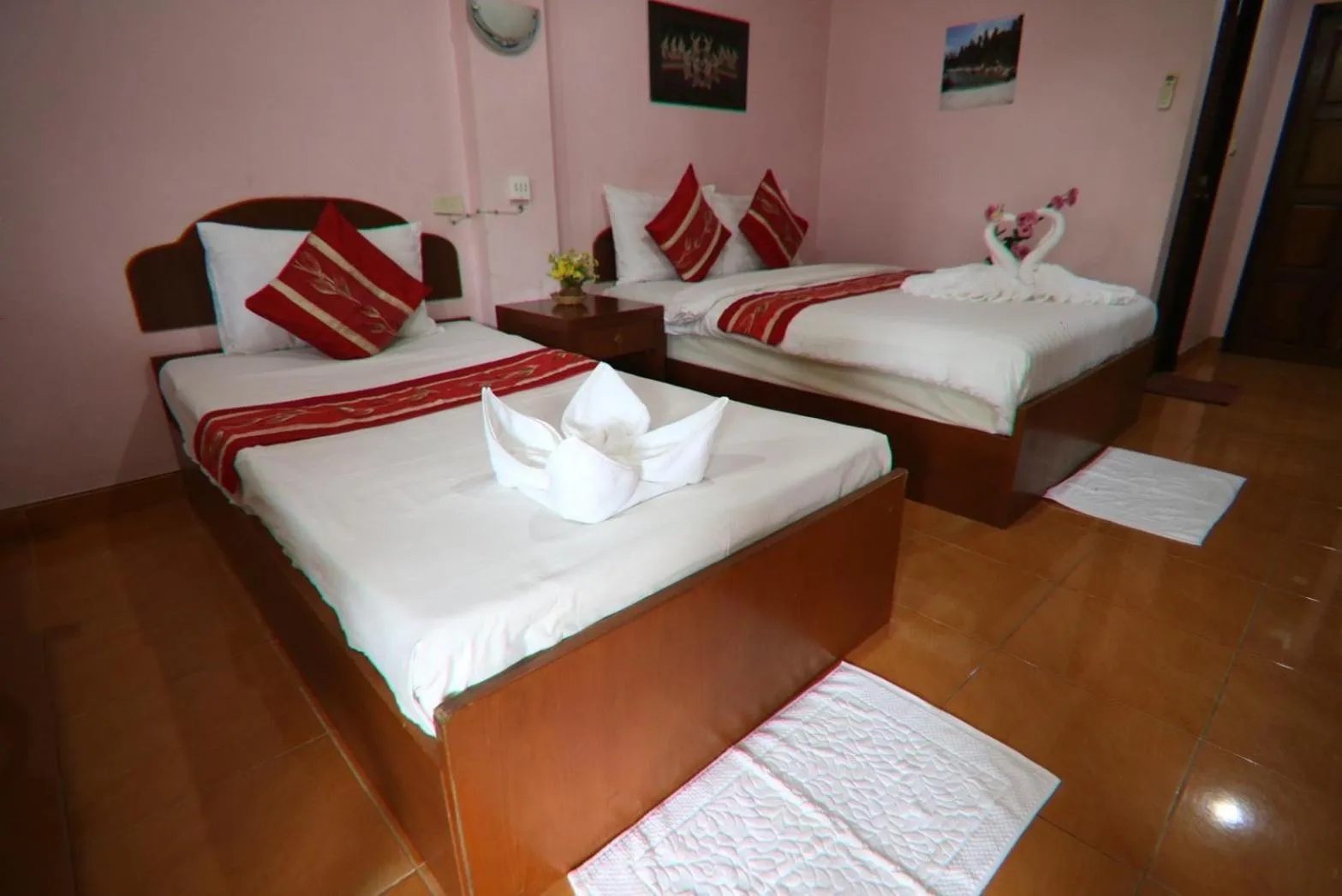 Bed in Coconut House Resort