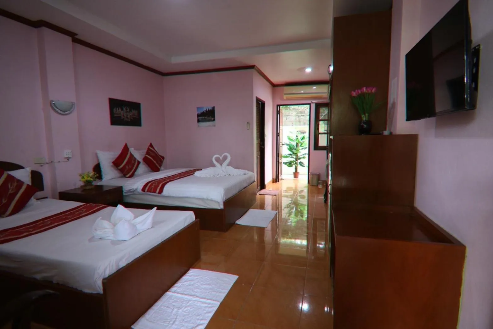 Bed in Coconut House Resort