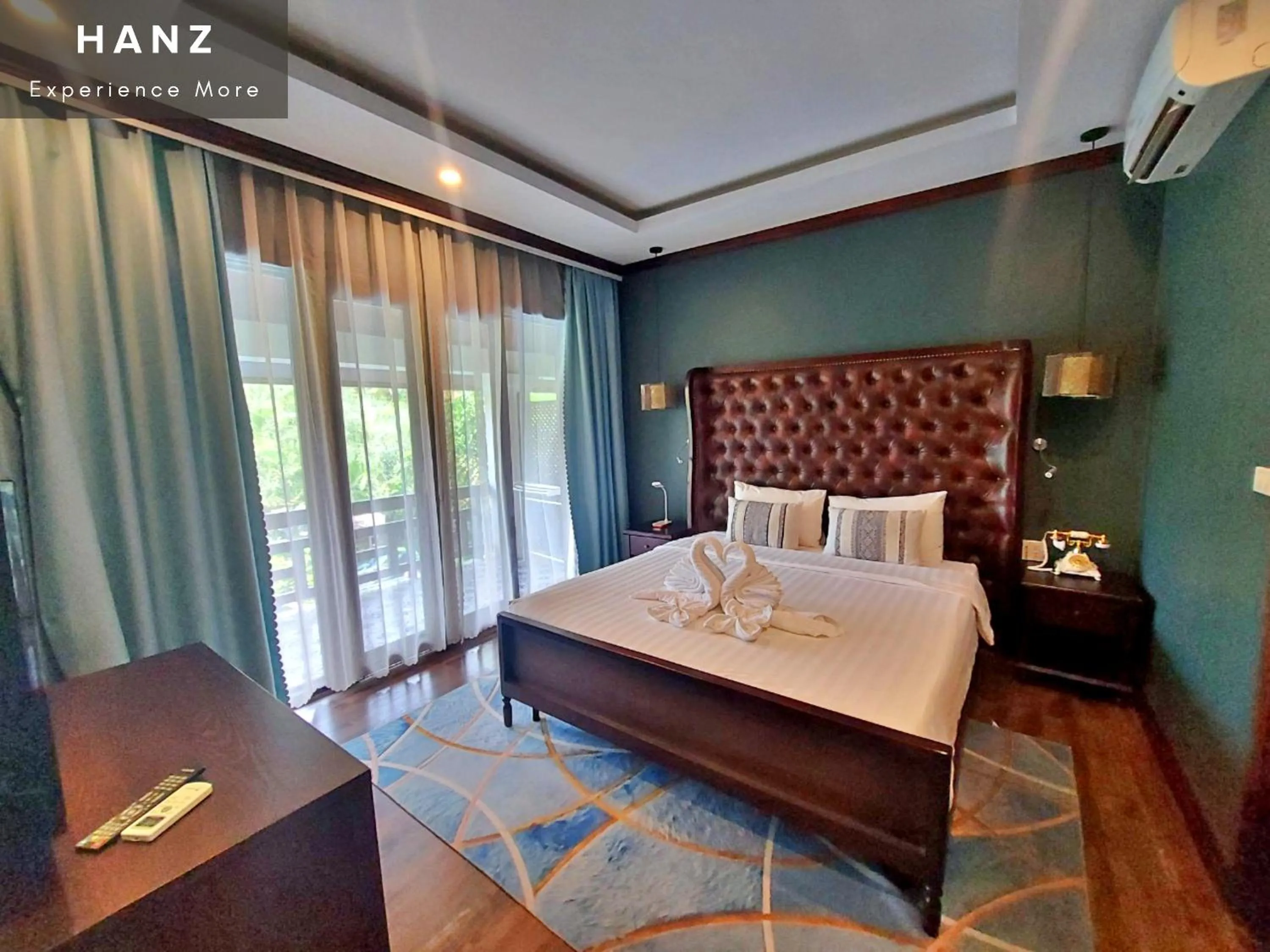 Bed in Sunrise Hotel Luang Prabang MekongRiver