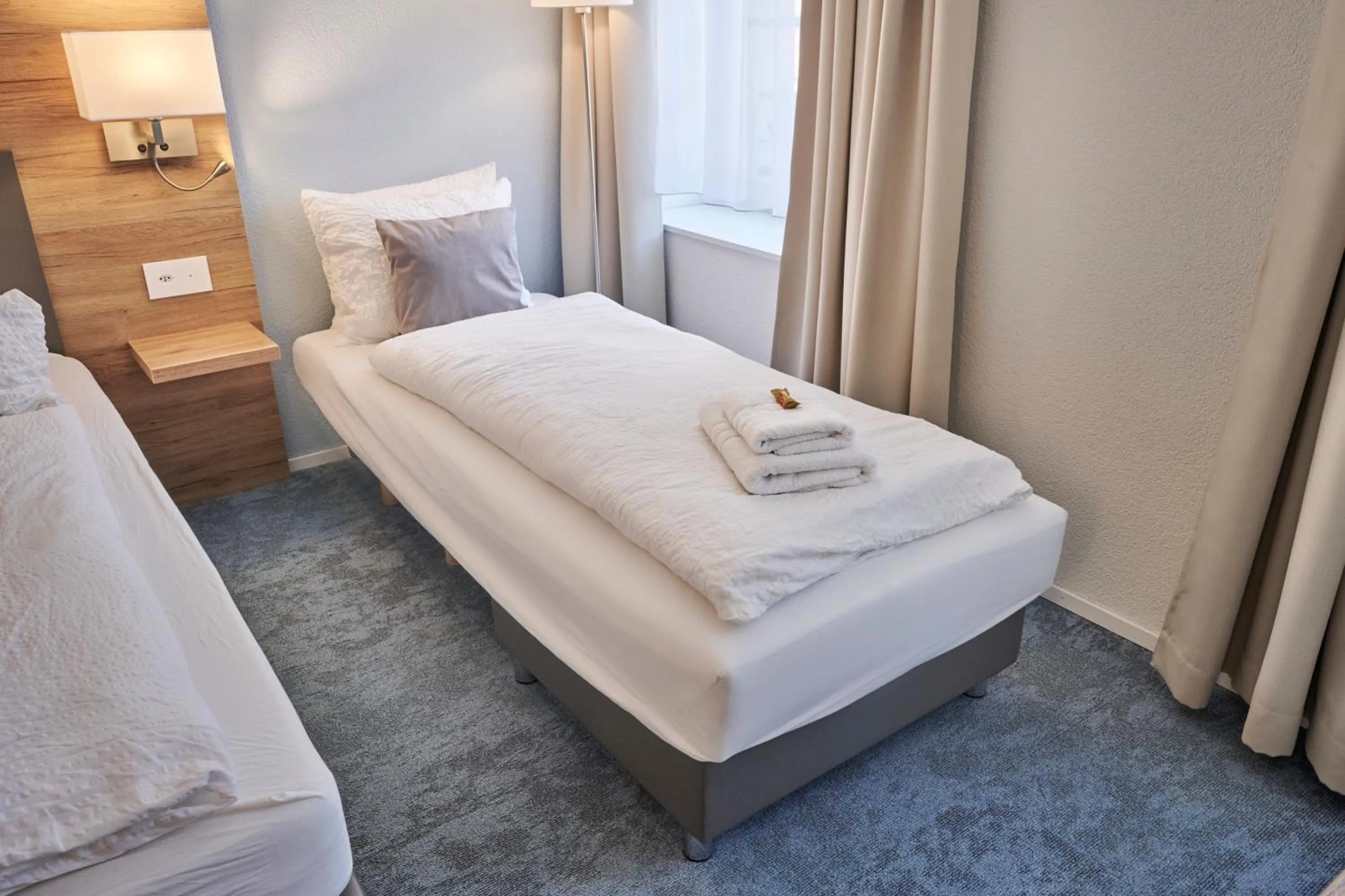 Bed in Aparthotel Krone - Self Check-In