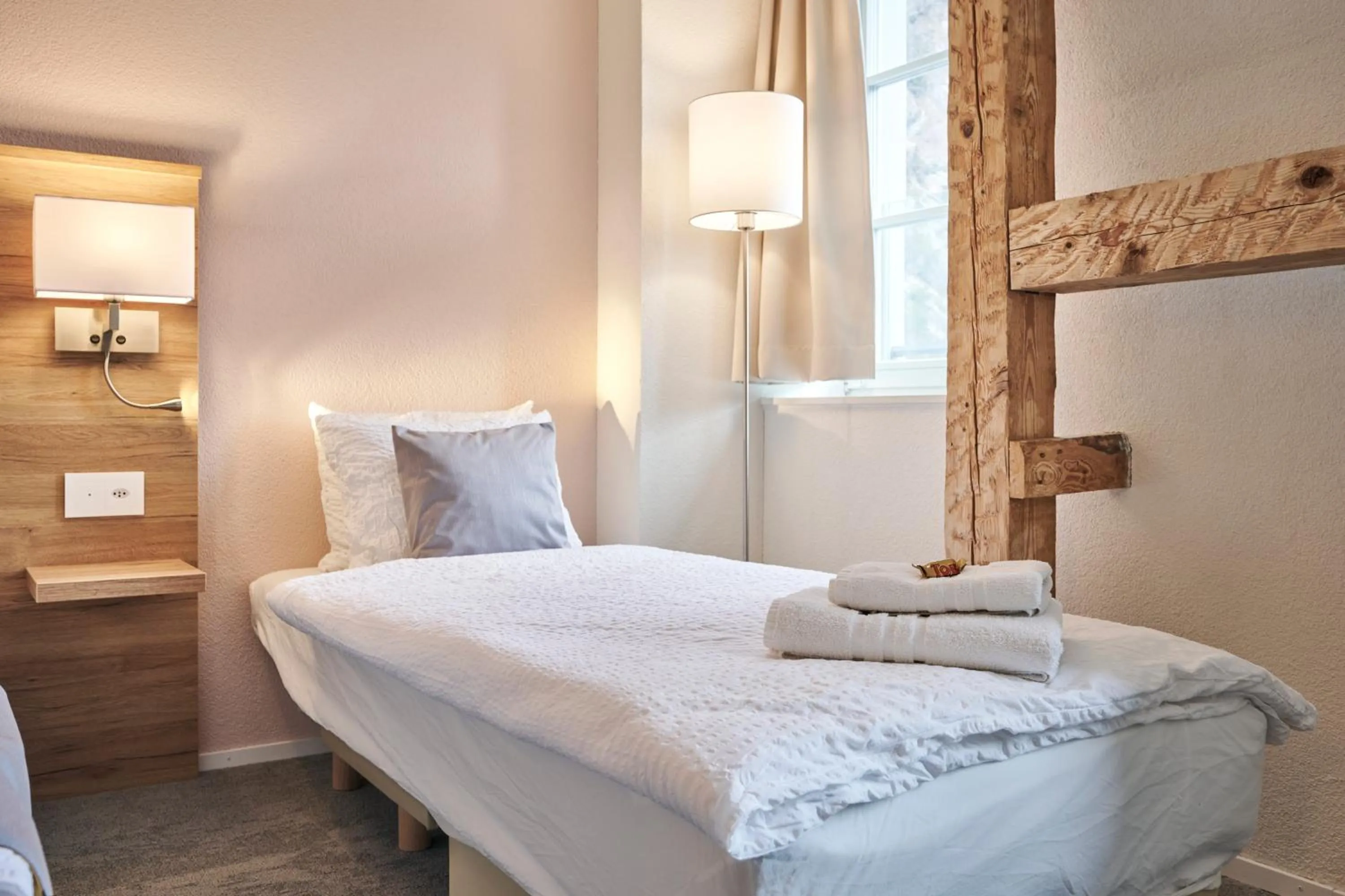 Bed in Aparthotel Krone - Self Check-In