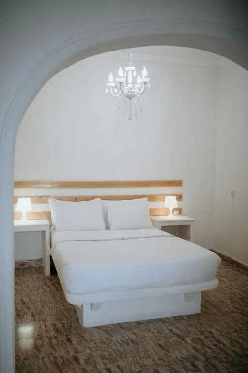 Bed in Hotel Thirasia