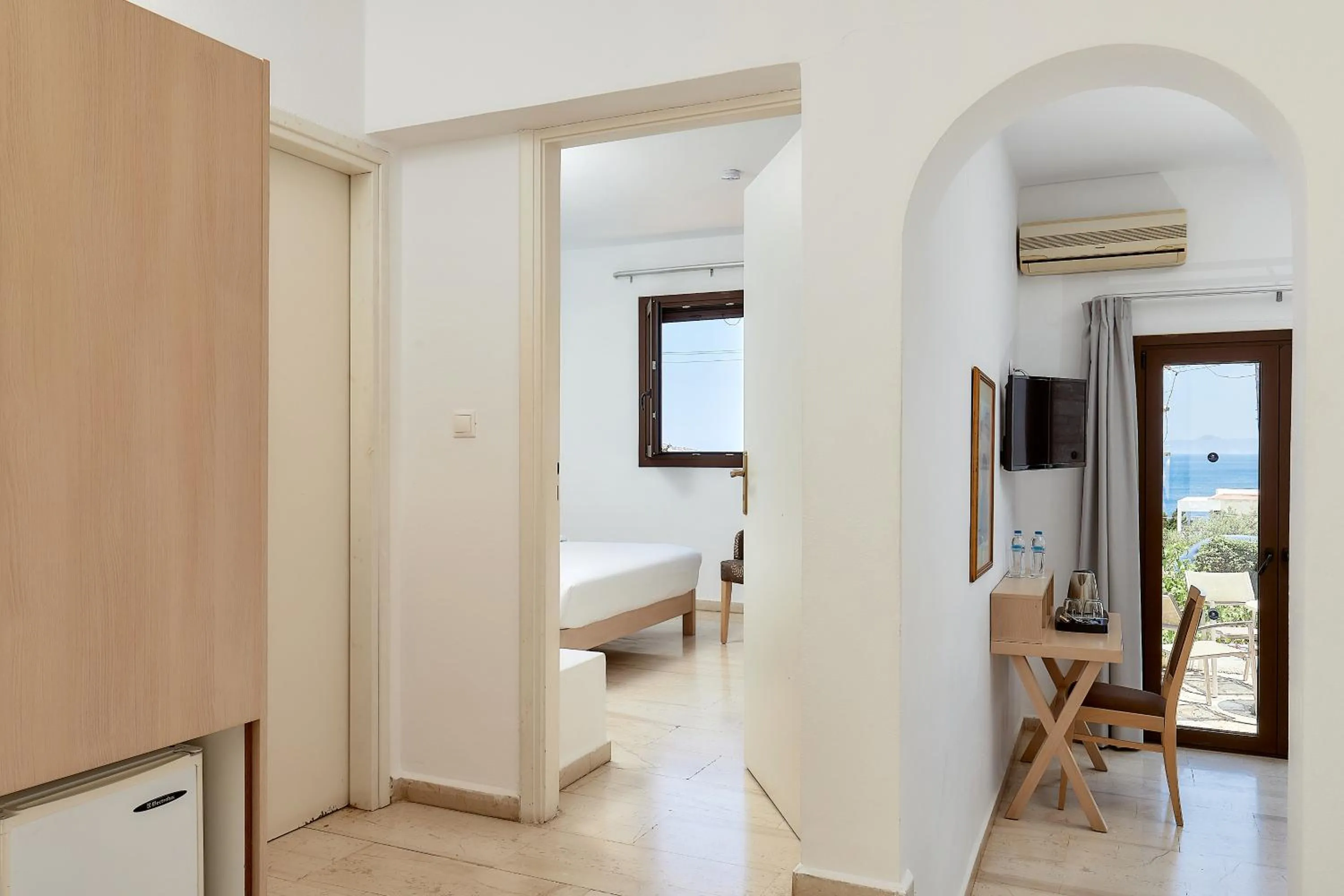 Photo of the whole room, Bed in Elounda Ilion Hotel Bungalows