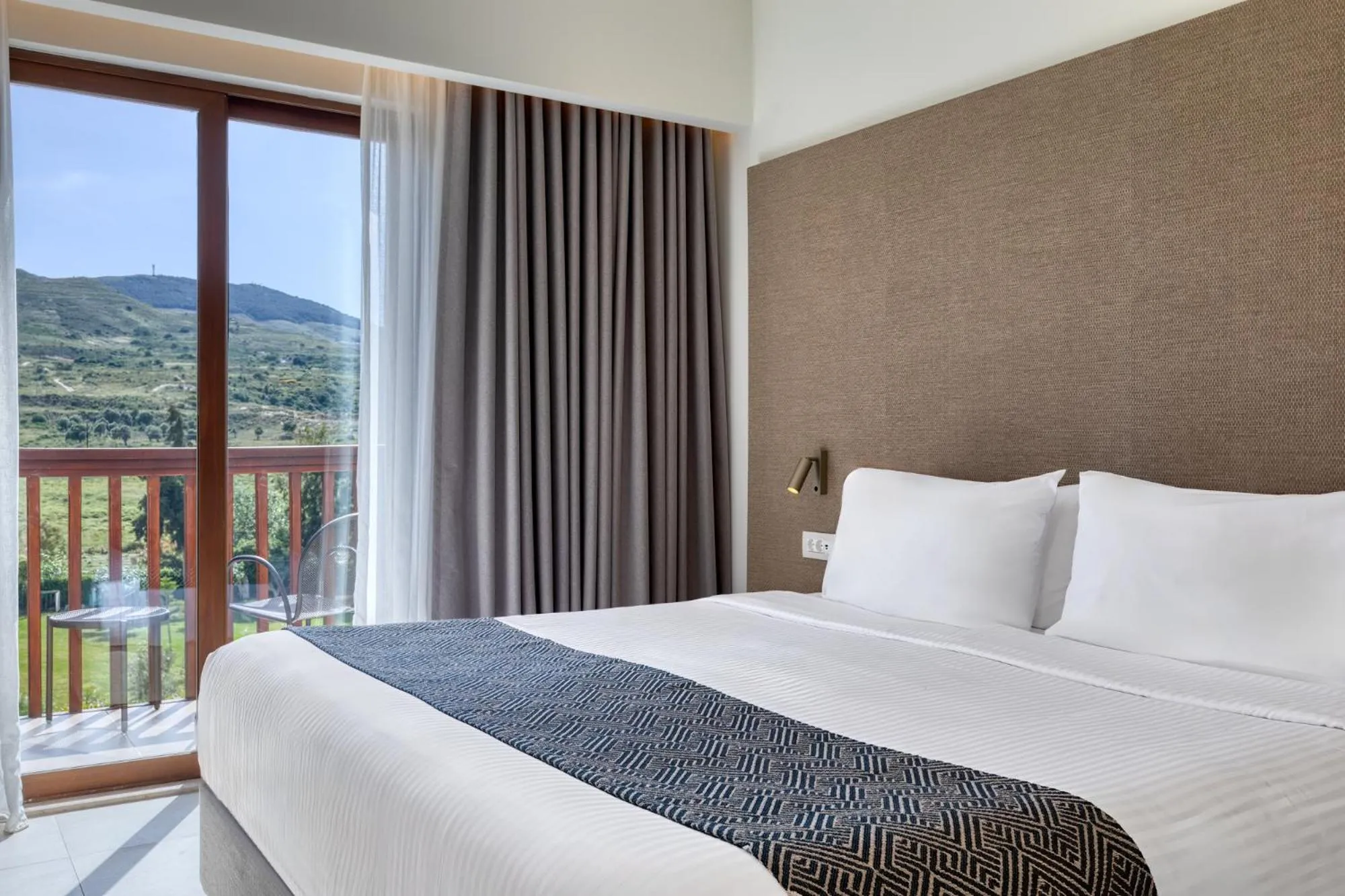 Bed in Oceanis Beach & Spa Resort