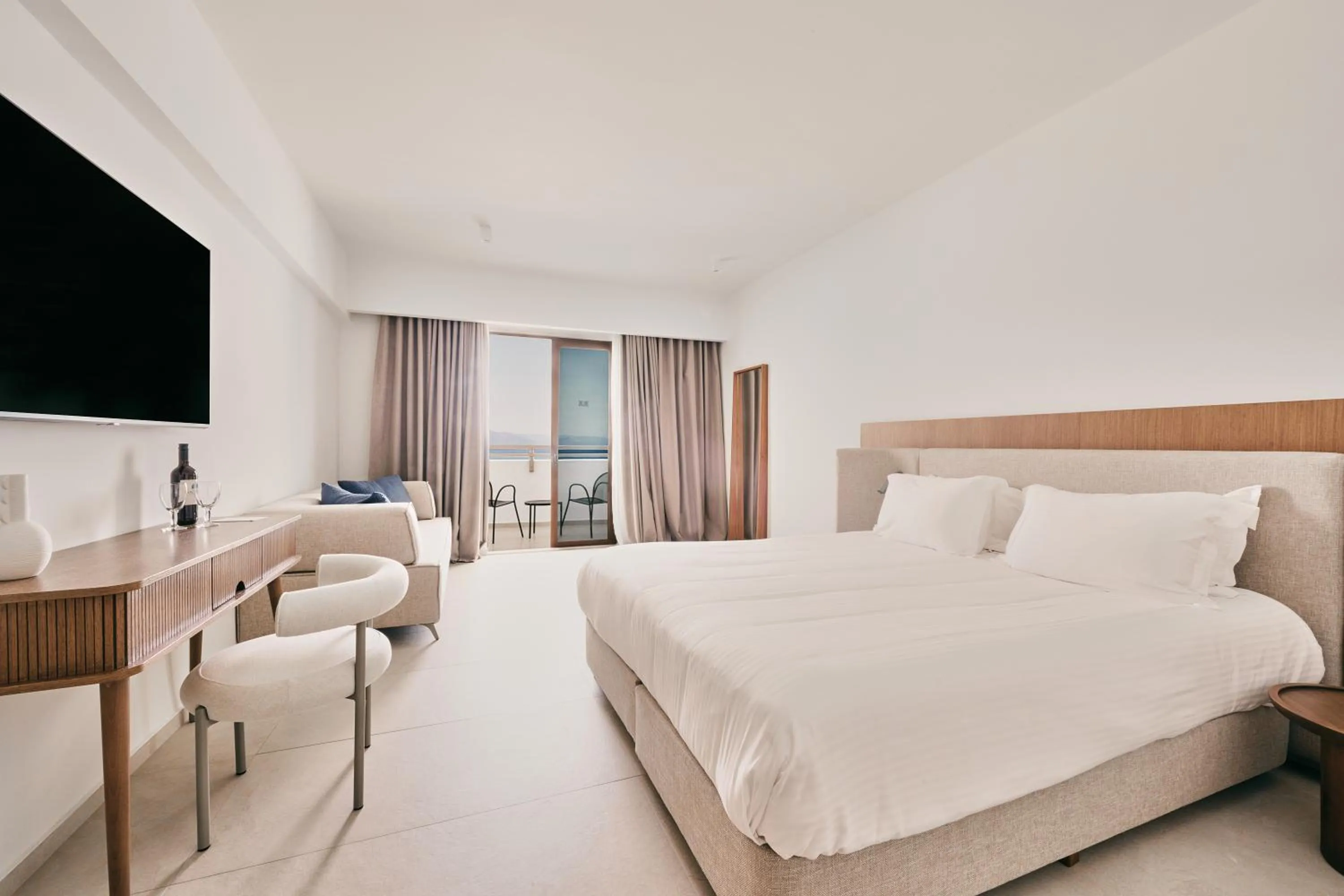 Bed in Oceanis Beach & Spa Resort