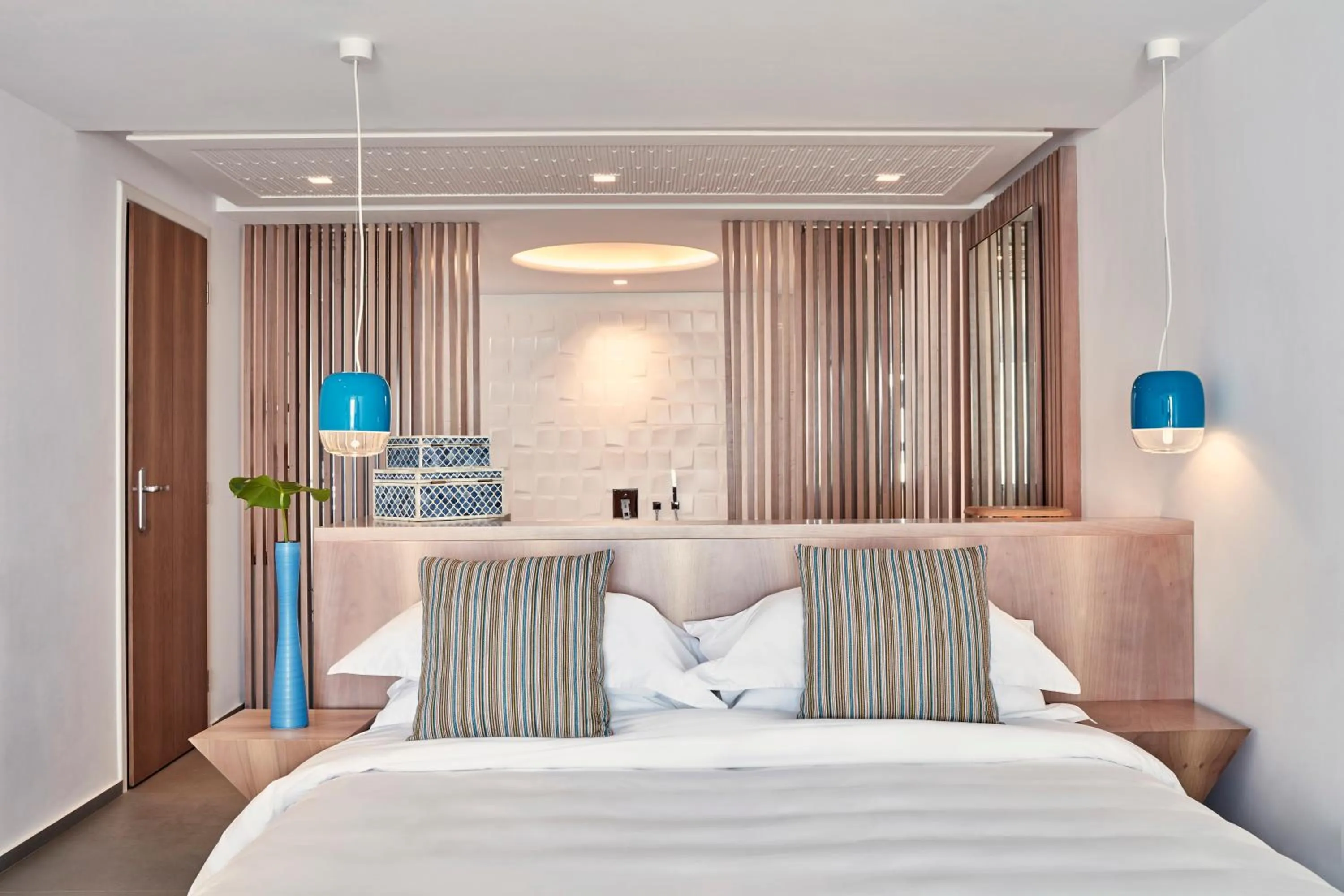 Bedroom in Myconian Korali Relais & Chateaux