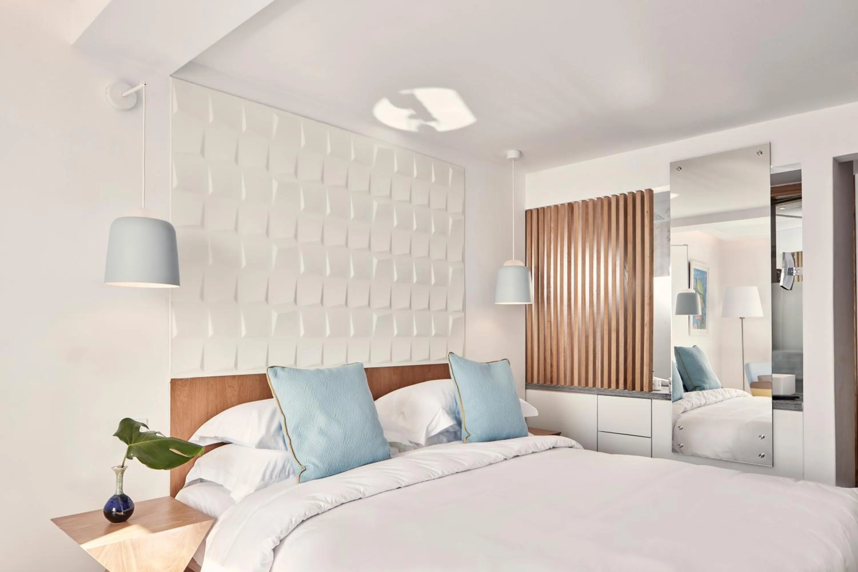 Bedroom in Myconian Korali Relais & Chateaux