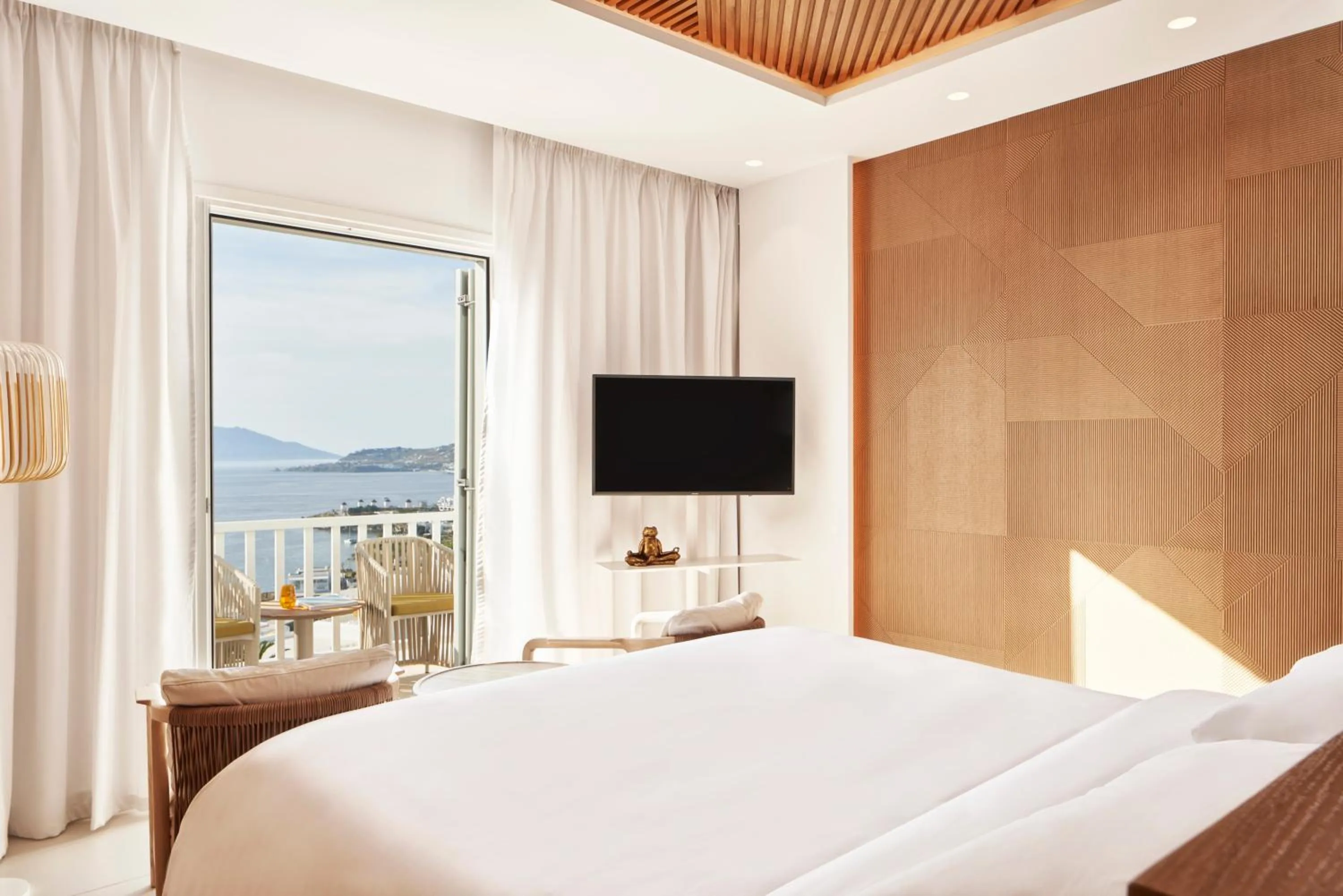 Bedroom in Myconian Korali Relais & Chateaux