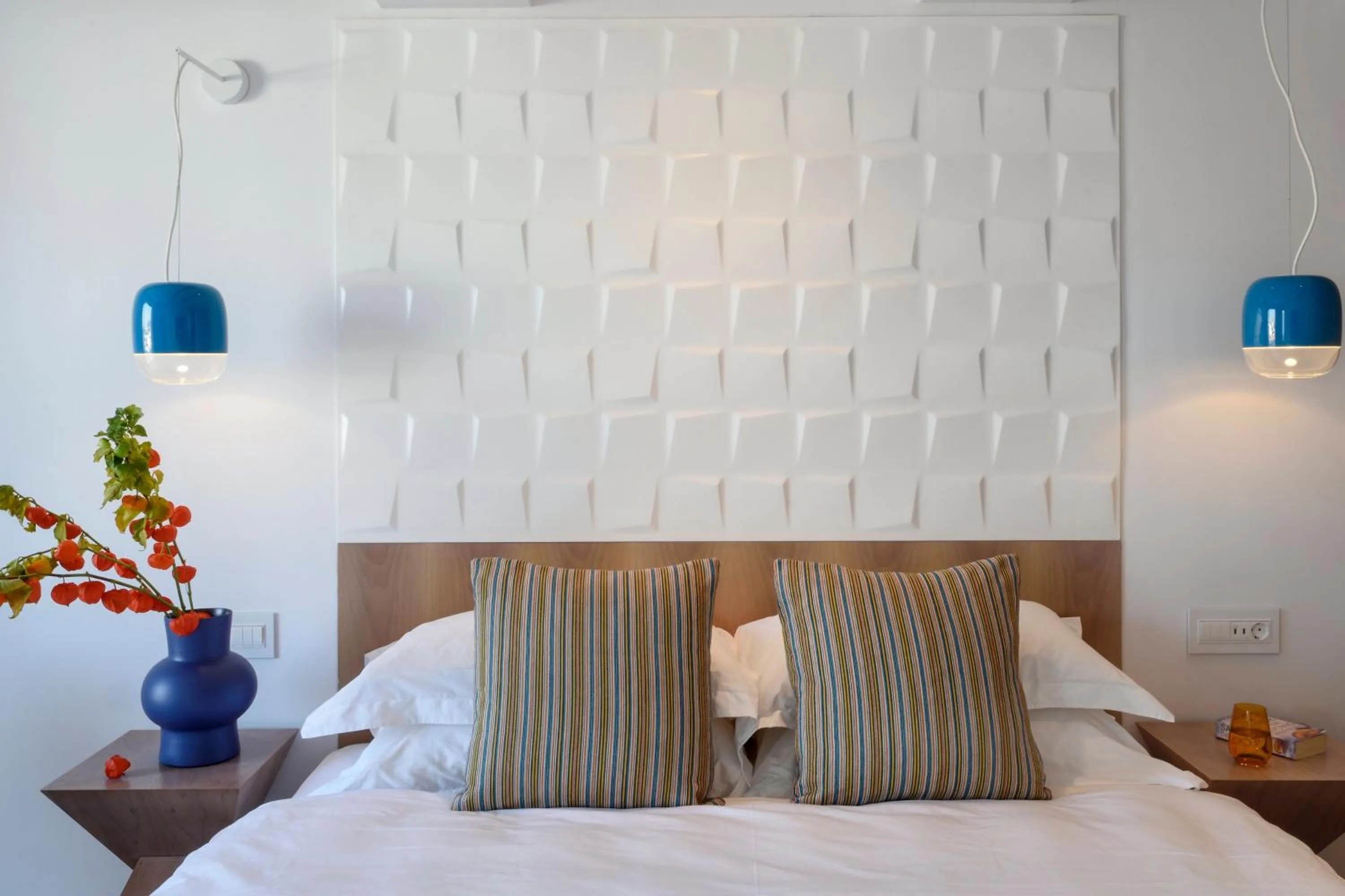 Bed in Myconian Korali Relais & Chateaux